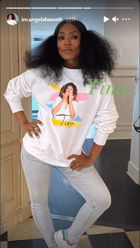 Angela Bassett's Instagram Story photo showing her wearing a white sweater printed with Tina Turner's image. | Photo: instagram.com/im.angelabassett