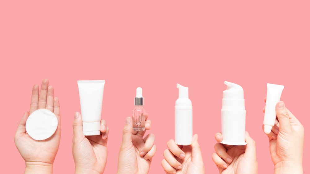 A photo of skincare products on a pink background. | Photo: Shutterstock