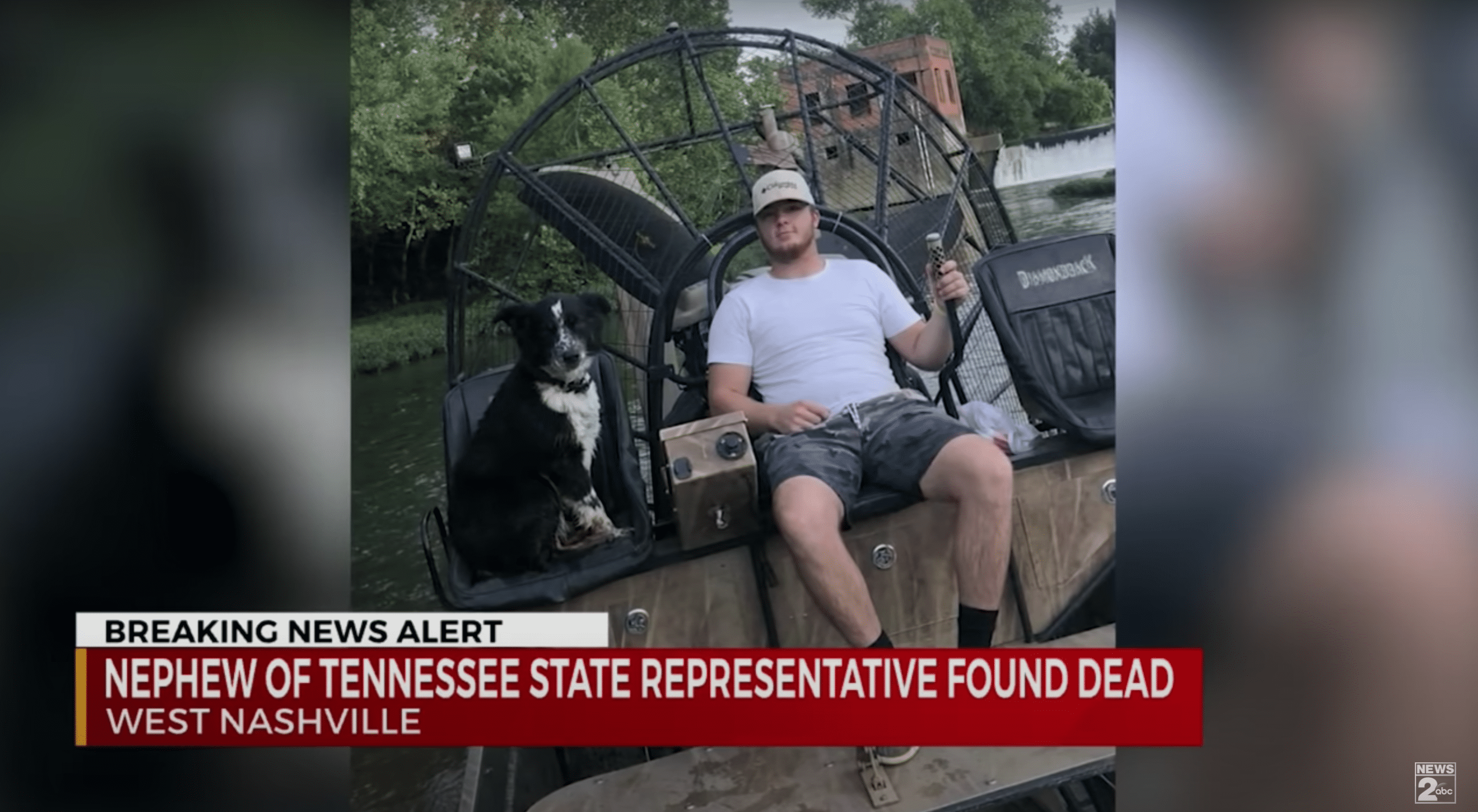 A man and his loyal canine companion sit next to a river prior to the dog owner's death | Photo: Youtube/WKRN News 2