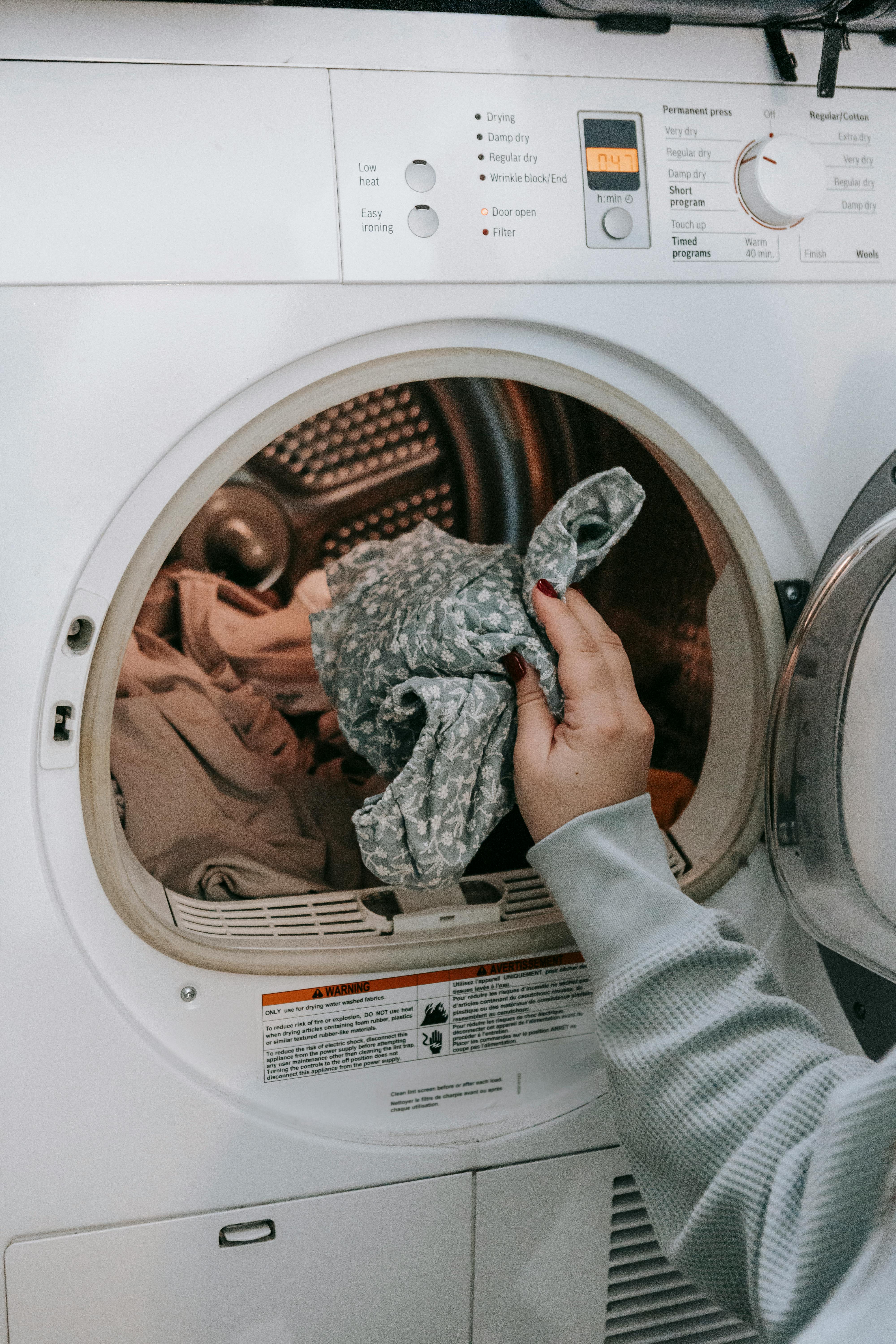 Laundry in the washing machine | Source: Pexels