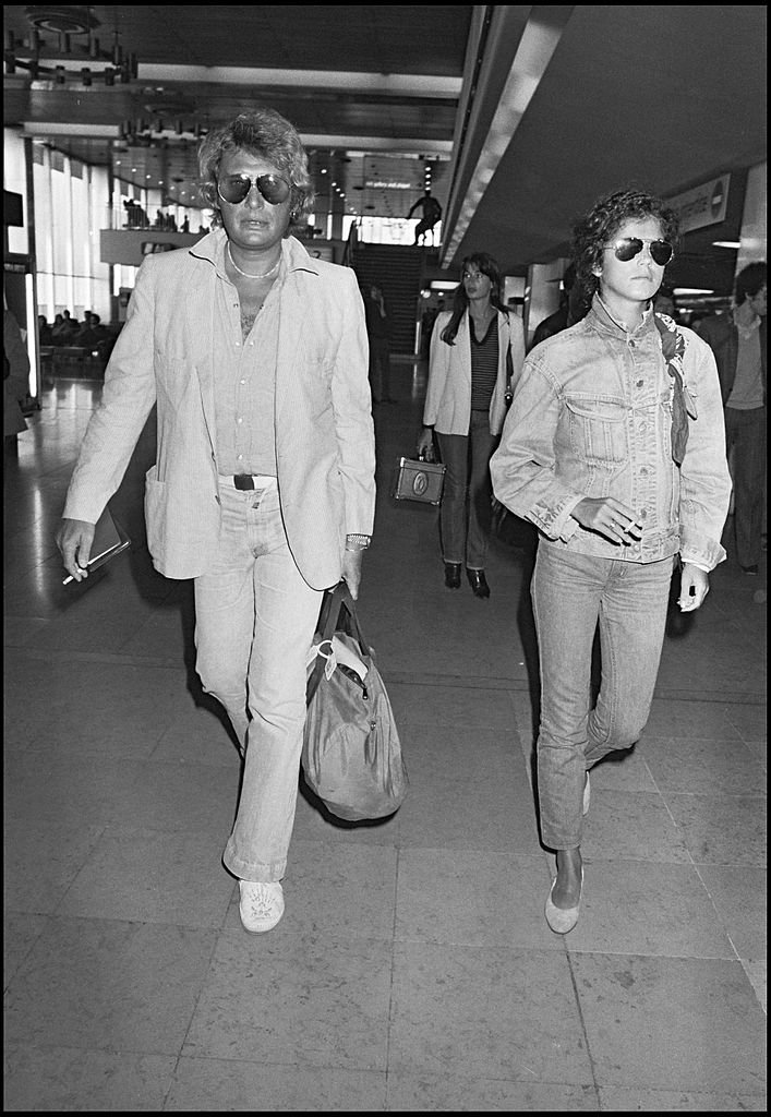 Johnny Hallyday et Babeth Etienne | Source : Getty Images