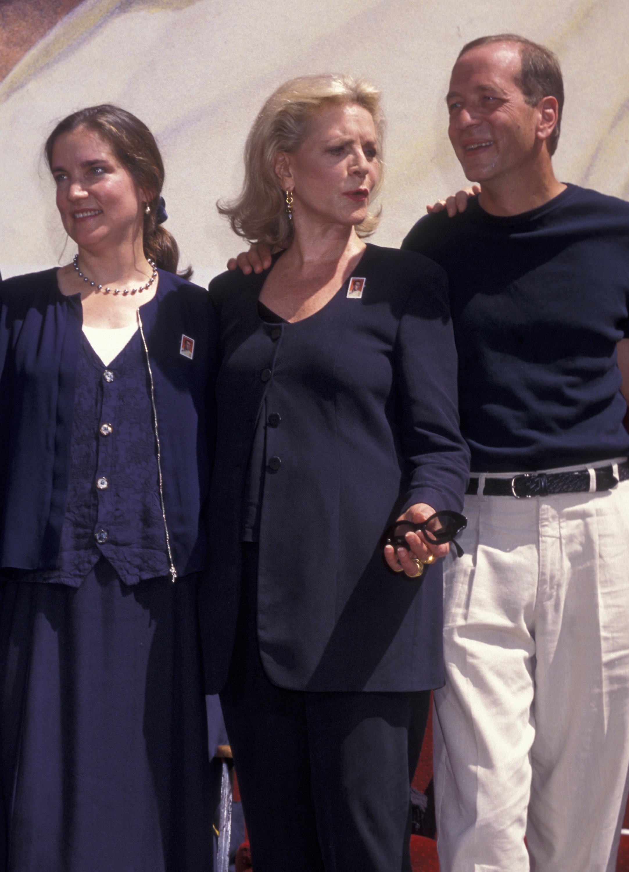 Leslie Bogart, Stephen Bogart and Lauren Bacall at the Humphrey Bogart Stamp Unveiling Ceremony on July 31, 1997, in California. | Source: Getty Images