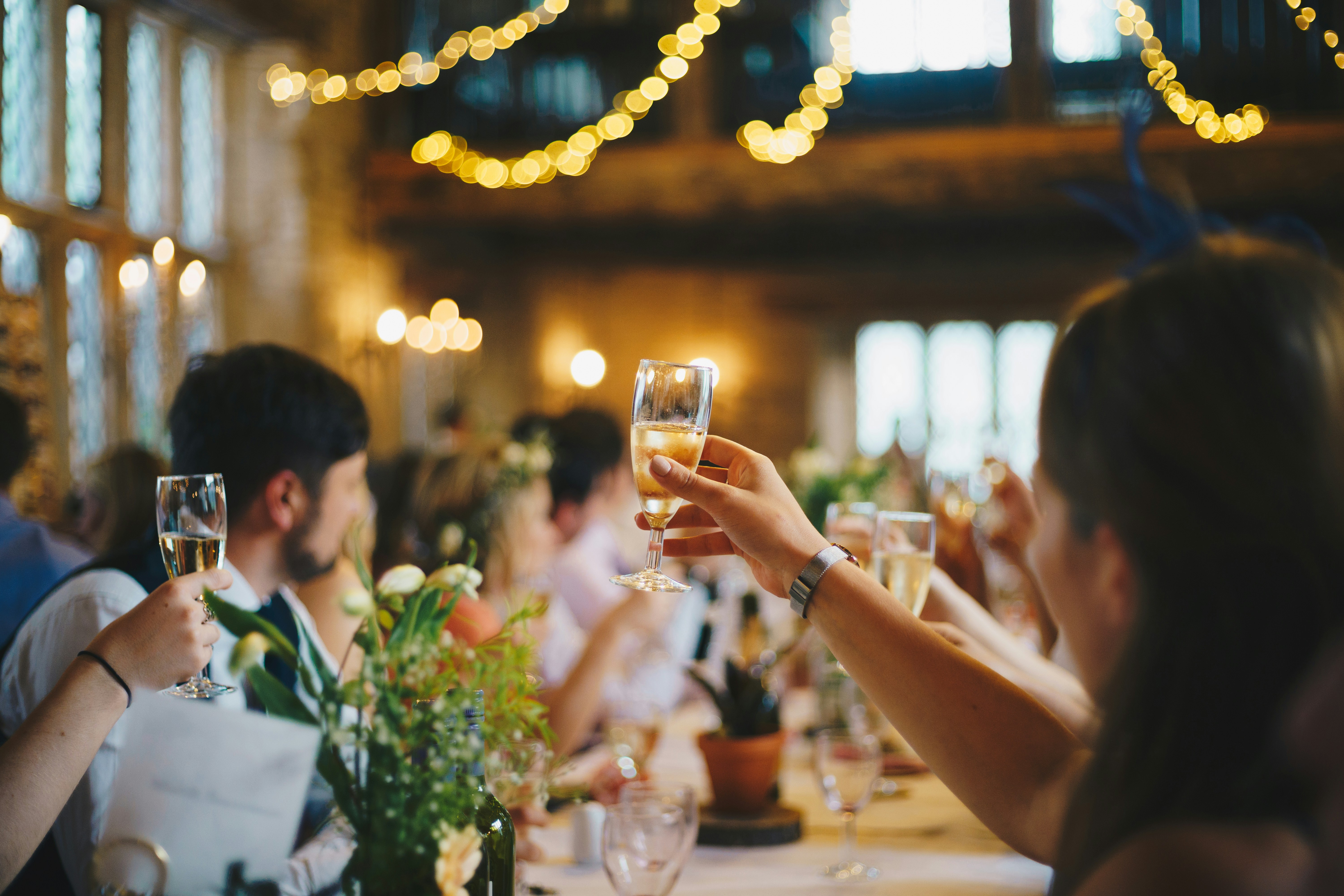 People at a wedding reception | Source: Unsplash