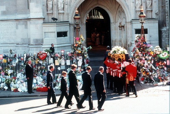 Earl Spencer, Prince William, Prince Harry, Prince Charles and the Duke of Edinburgh follow the coffin to the funeral cortege of Diana, Princess of Wales as it arrives at Westminster Abbey on September 6, 1997, in London, England. | Source: Getty Images.
