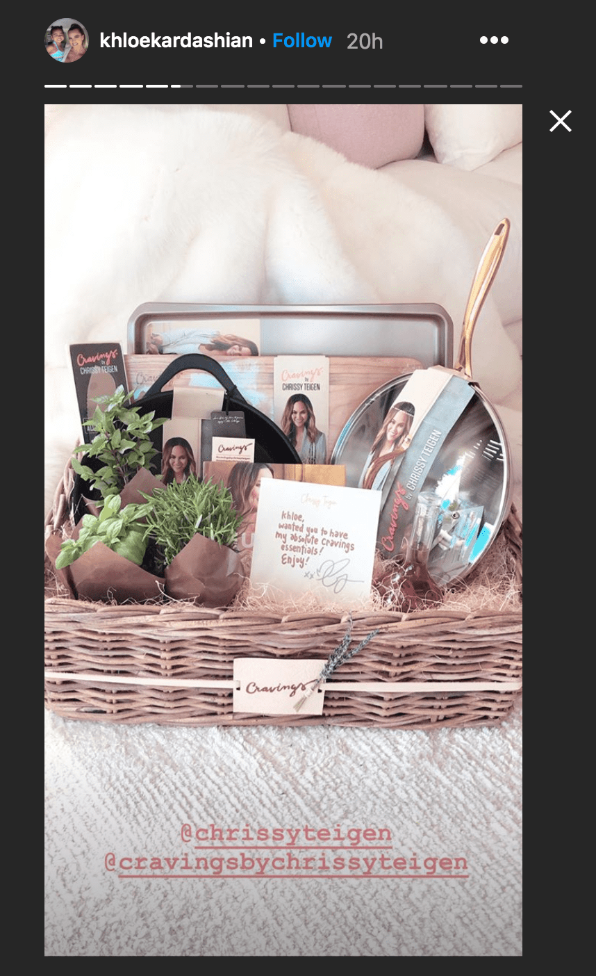 Khloe Kardashian shared a video of her opening the "Cravings" cooking line gift basket she received from Chrissy Teigen | Source: Instagram.com/khloekardashian