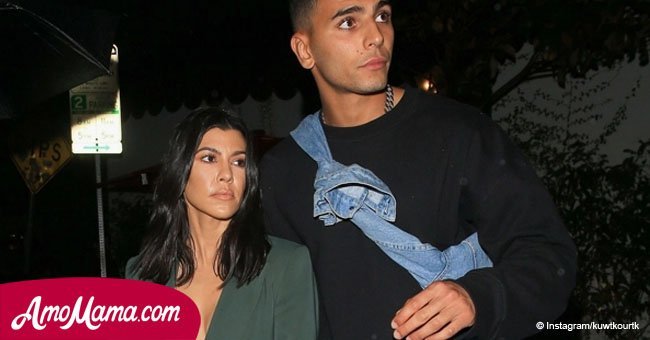 Kourtney Kardashian wears nothing under jacket and reveals too much