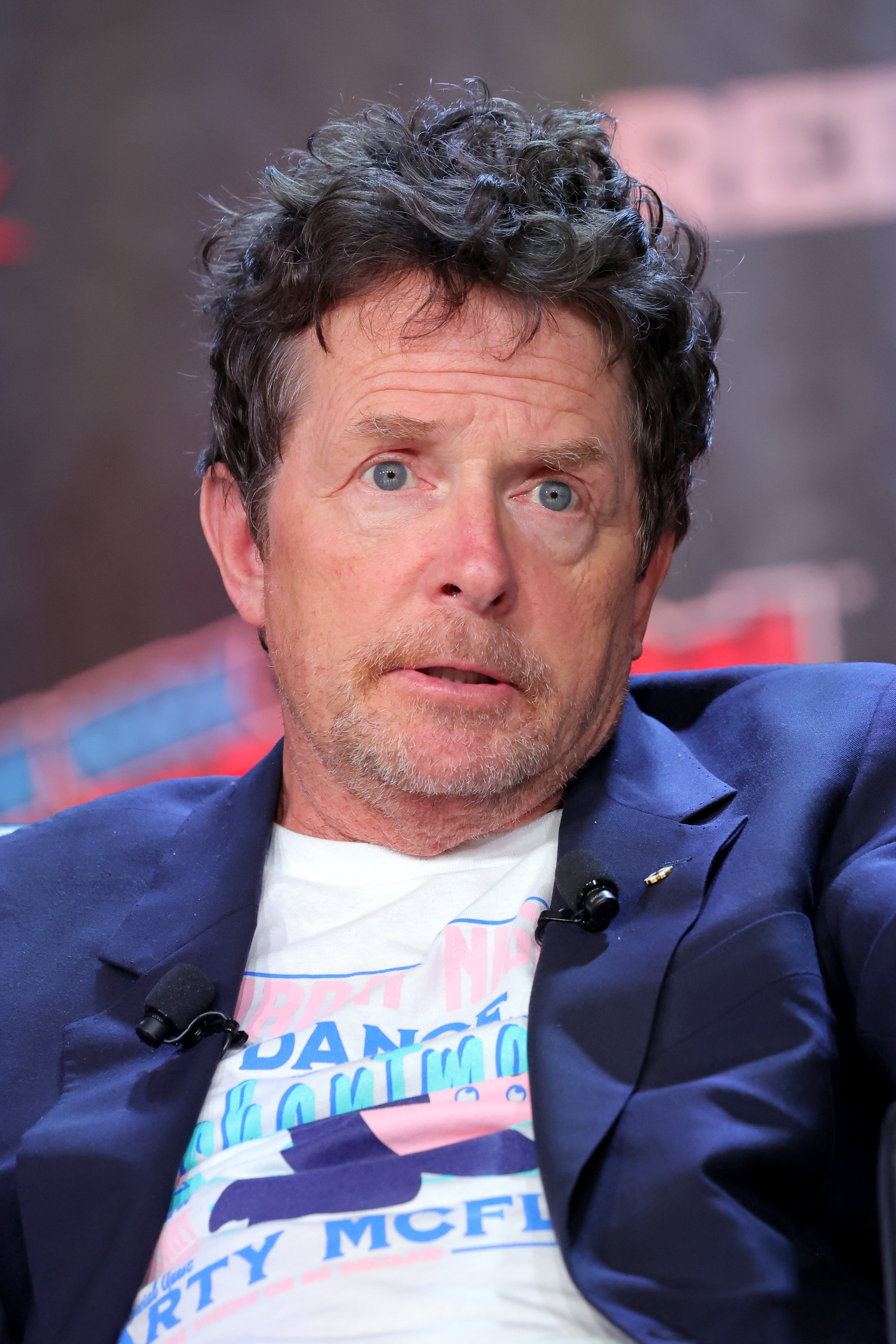 Michael J. Fox speaks during a "Back To The Future Reunion" panel at New York Comic Con on October 08, 2022 in New York City | Source: Getty Images 