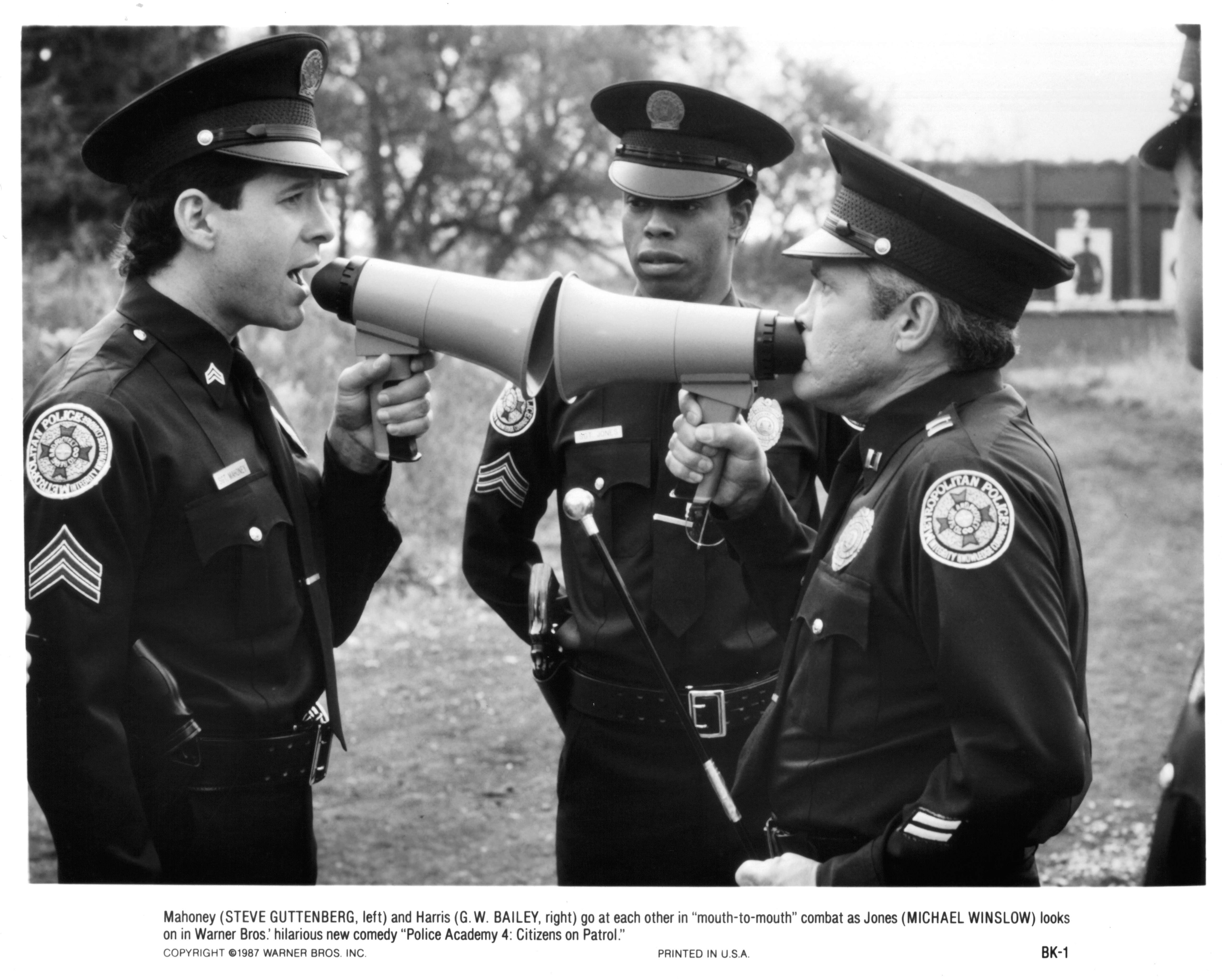 Actor Michael Winslow with Steve Guttenberg and G.W. Bailey on the set of the movie "Police Academy 4: Citizens on Patrol" in 1987 | Photo: Getty Images