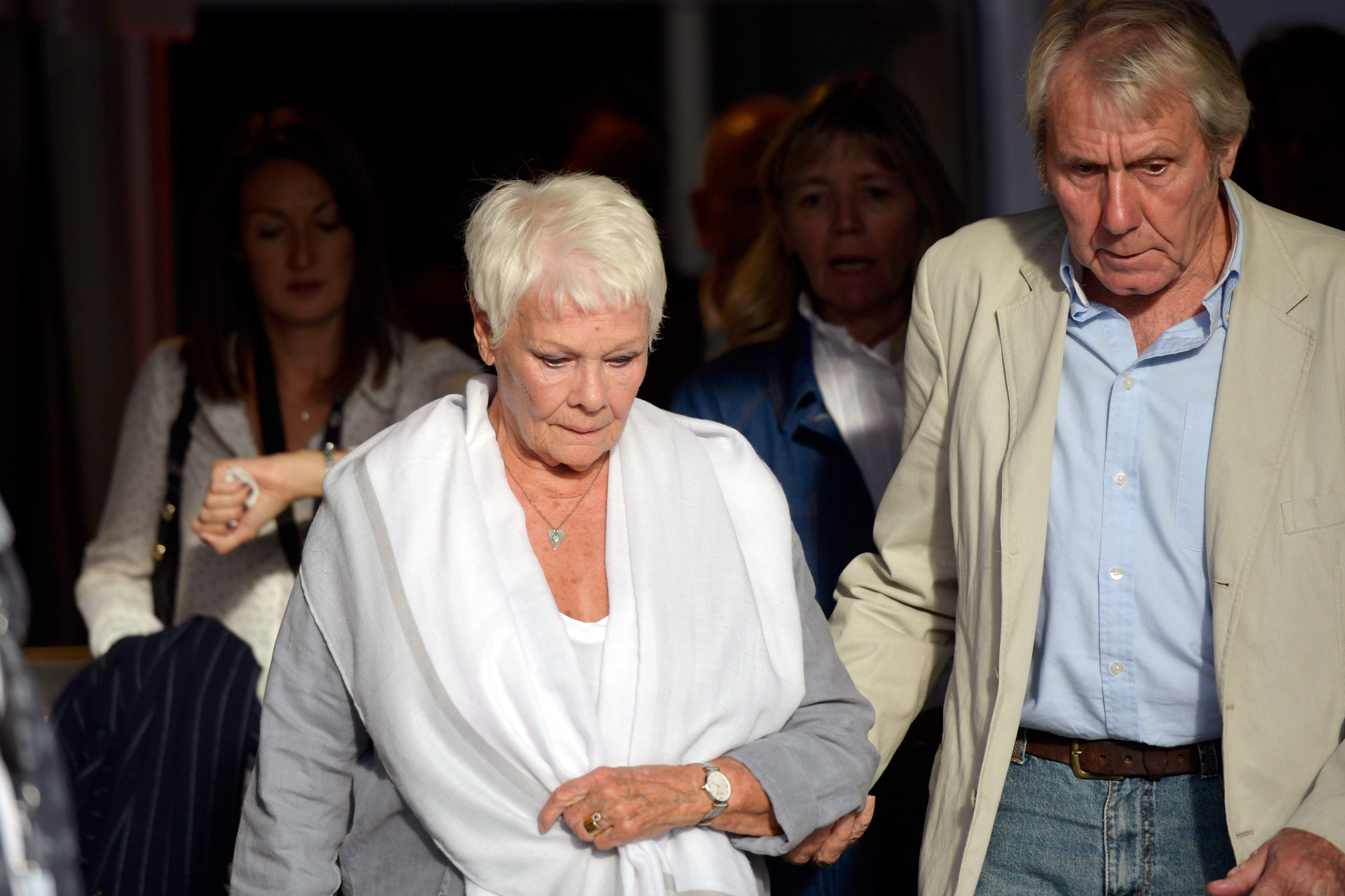 Judi Dench and David Mills leave after the 'Red Joan' press conference during the 14th Zurich Film Festival on October 03, 2018 in Zurich, Switzerland. | Source: Getty Images