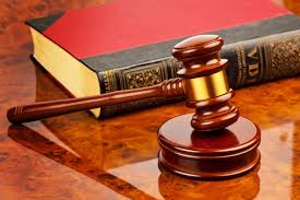 Gavel and a law book  | Photo: Shutterstock