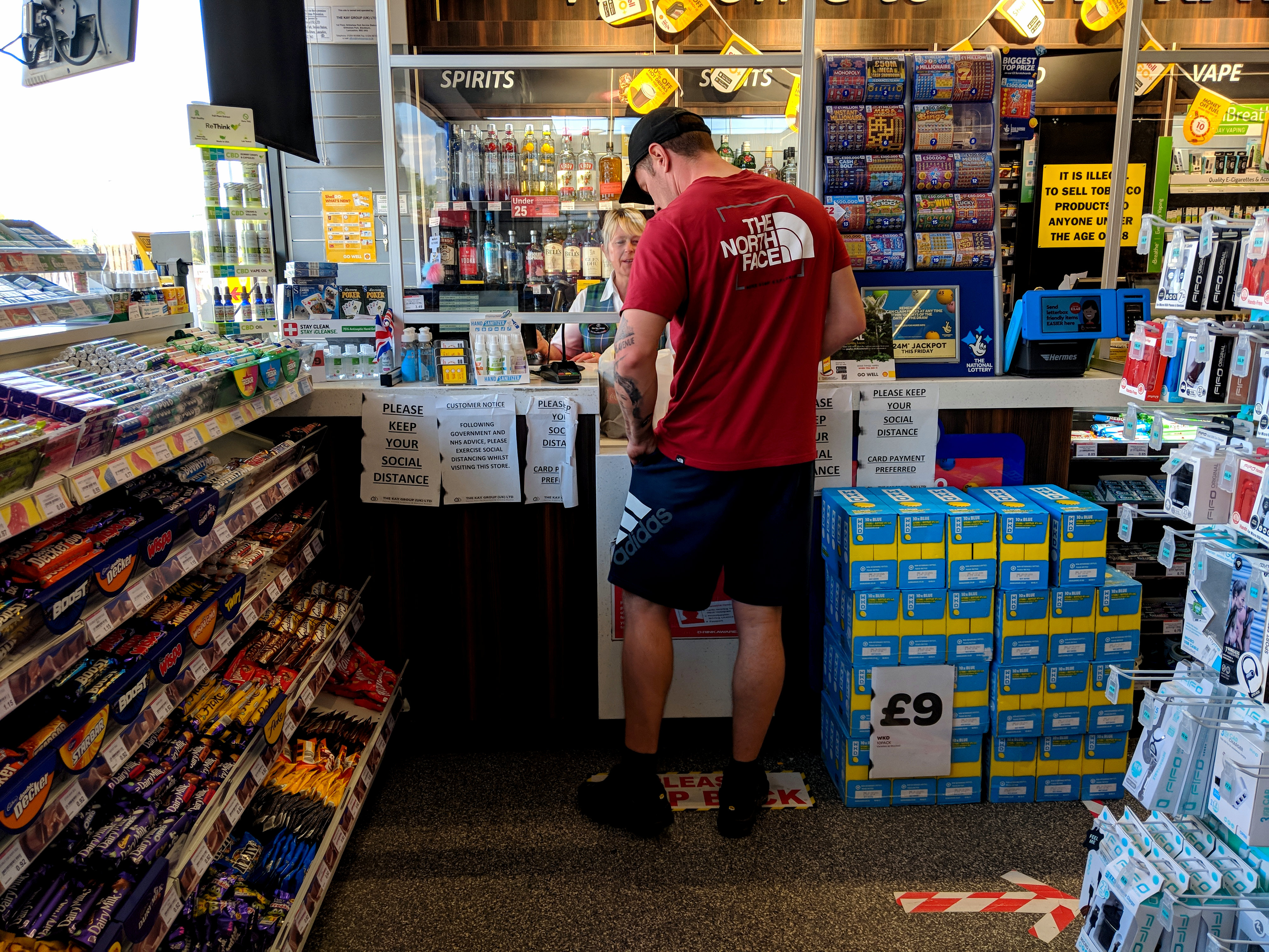 Man is shopping at the gas station | Source: Shutterstock.com
