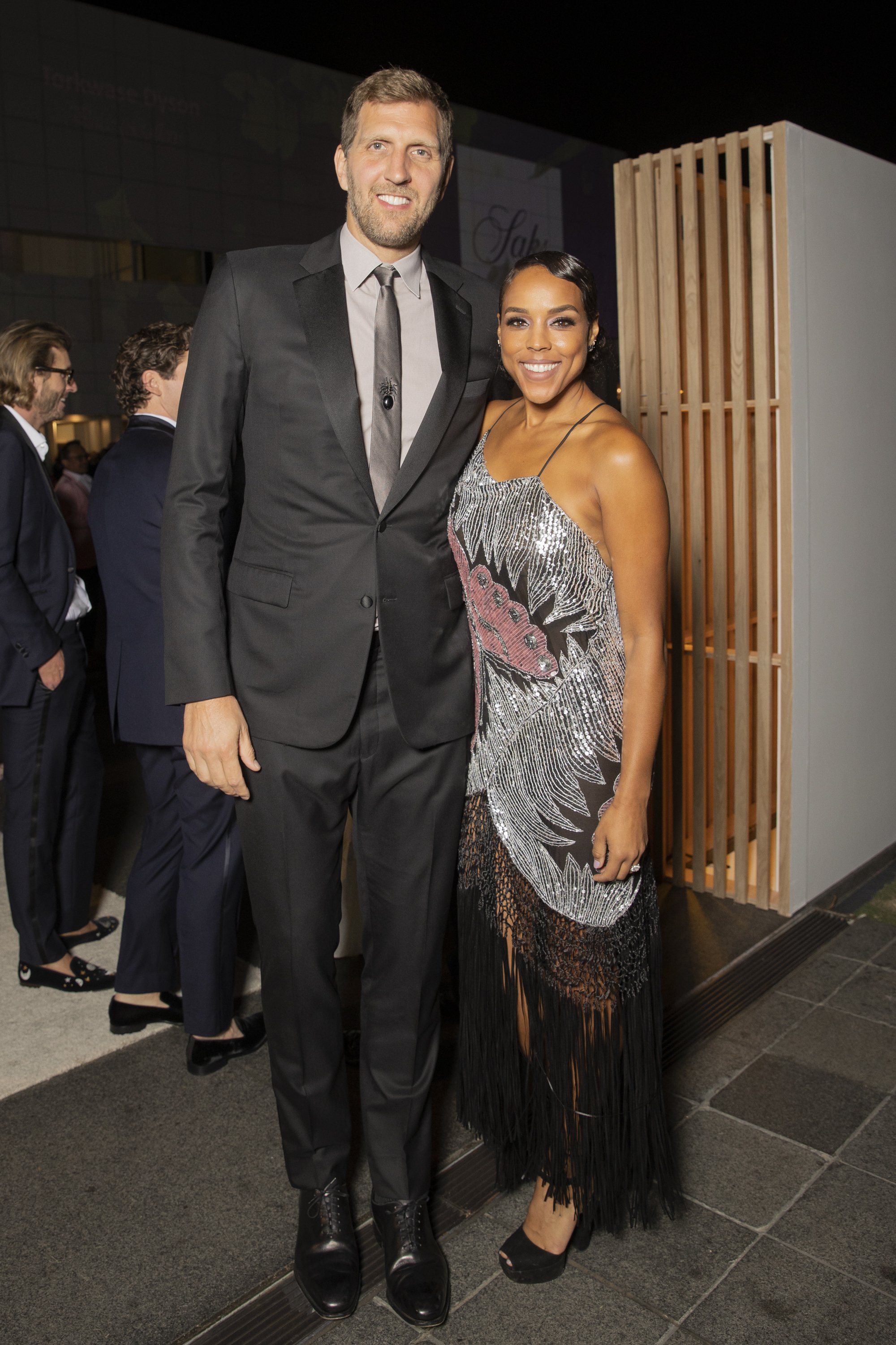 Dirk Nowitzki and Jessica Olsson pose at the TWO x TWO for AIDS and Art 2022 Gala and Auction at the Rachofsky House on October 22, 2022, in Dallas, Texas | Source: Getty Images