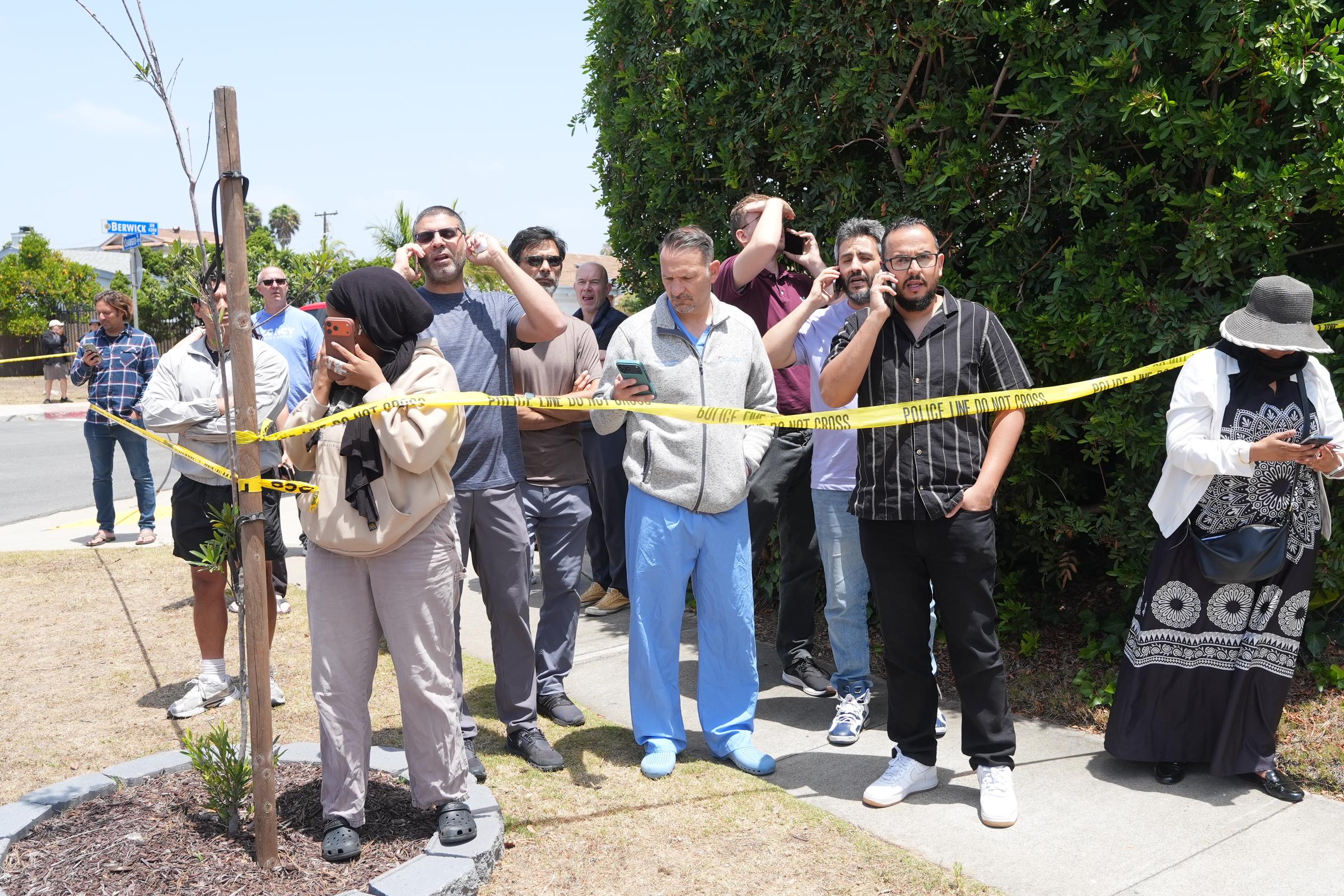 Community members gather near the Islamic Center of San Diego after the shooting on May 18, 2026 | Source: Getty Images