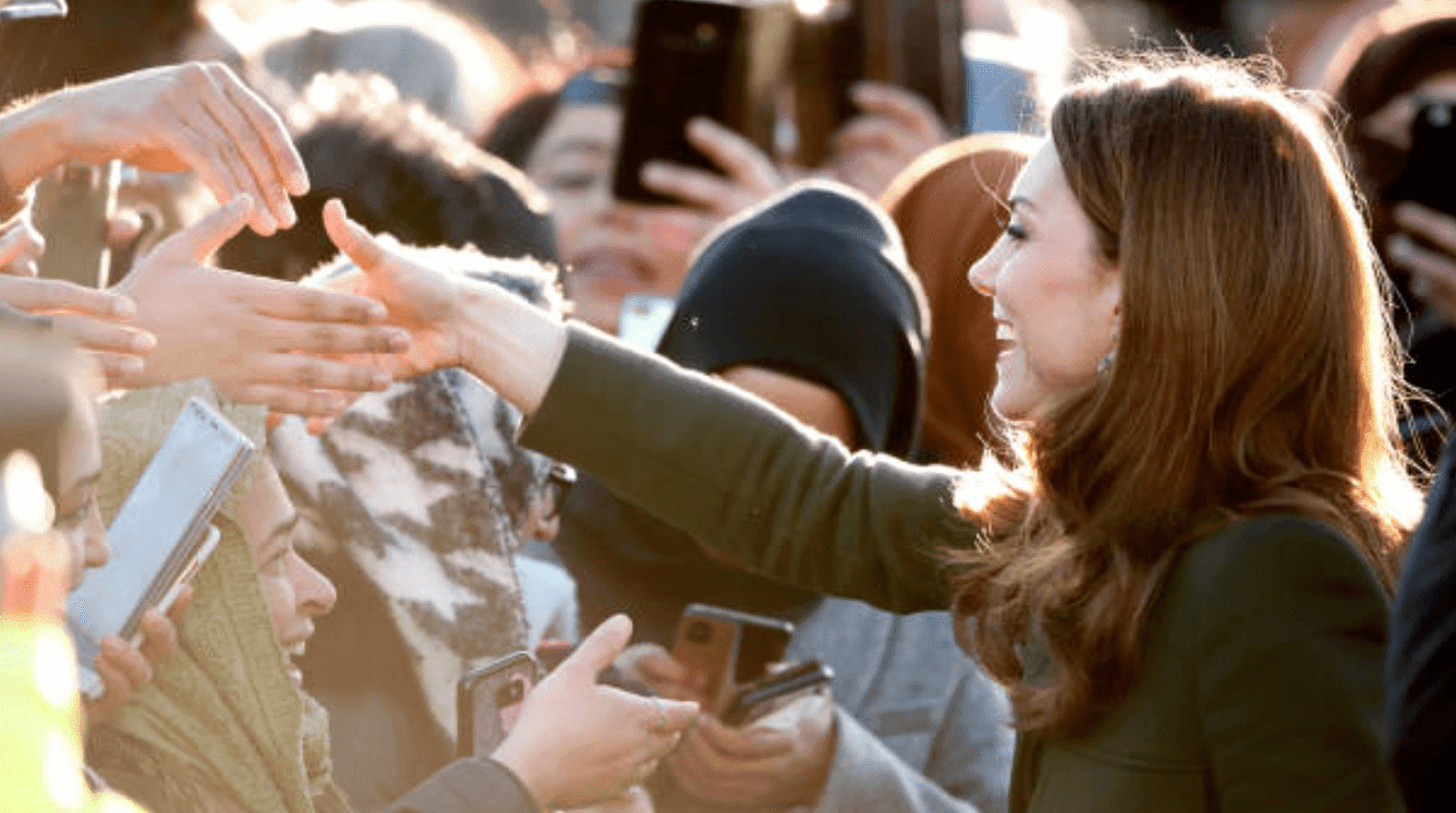 During her first engagement of the year, Kate Middleton shakes hands with crowds during a visit at the Khidmat Centre, on January 15, 2020, in Bradford, England | Source: Max Mumby/Indigo/Getty Images