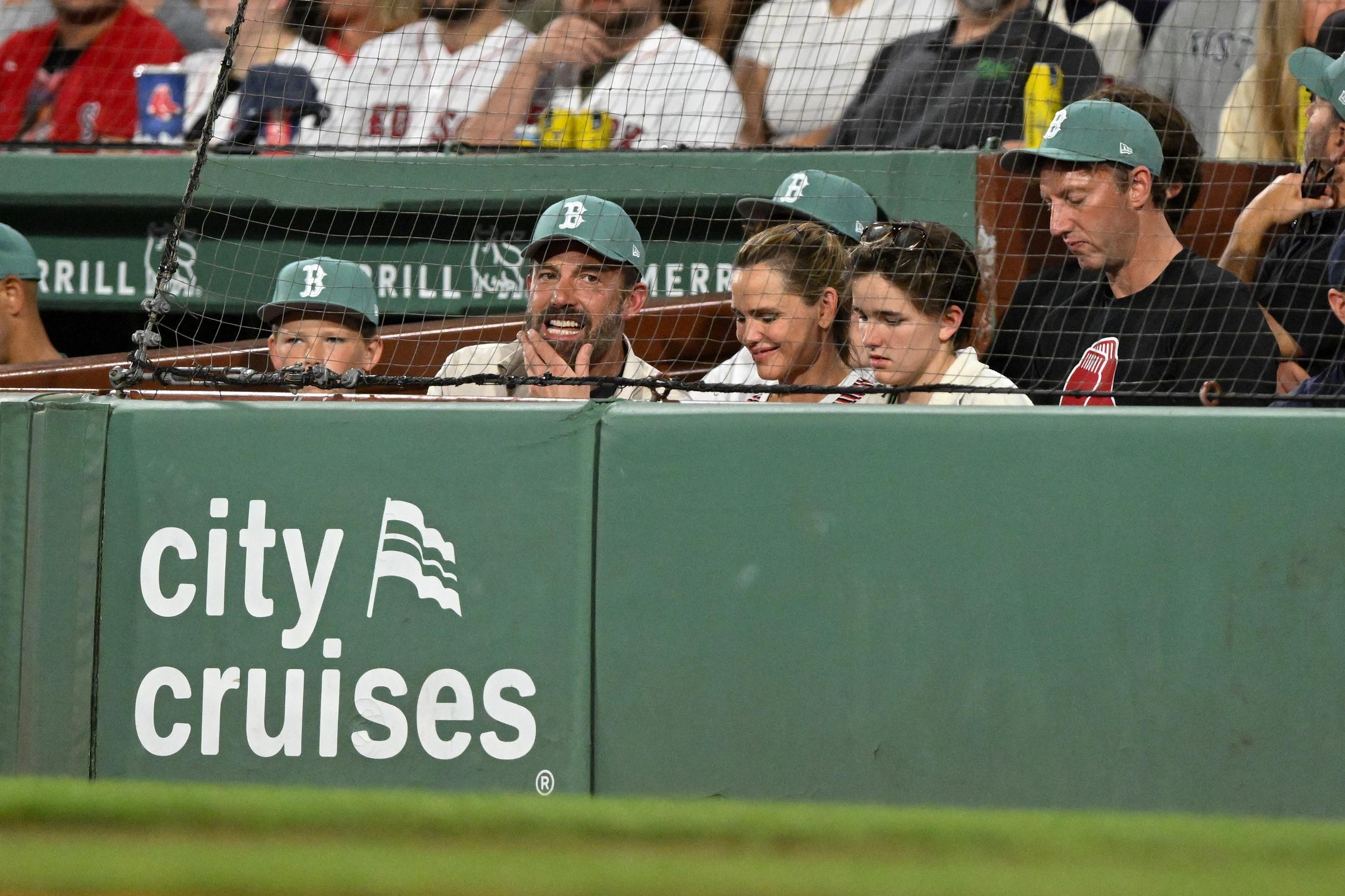 Ben Affleck and Jennifer Garner are pictured watching a game with their children, Fin and Samuel, during the fourth inning between the Boston Red Sox and the Tampa Bay Rays at Fenway Park on July 11, 2025, in Massachusetts | Source: Getty Images