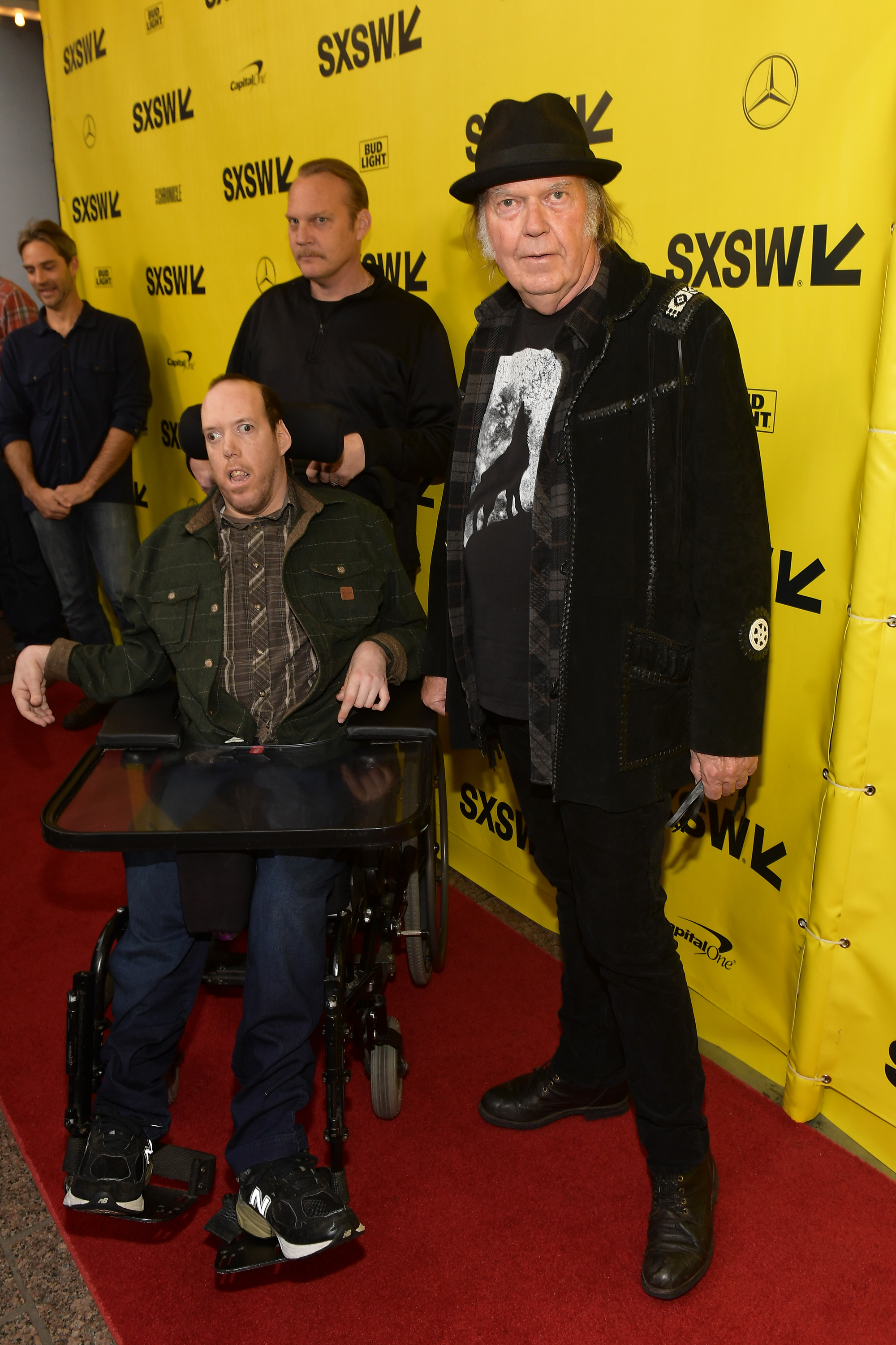 Zeke Young, Ben Young, and Neil Young attend the "Paradox" premiere in 2018, in Austin, Texas.