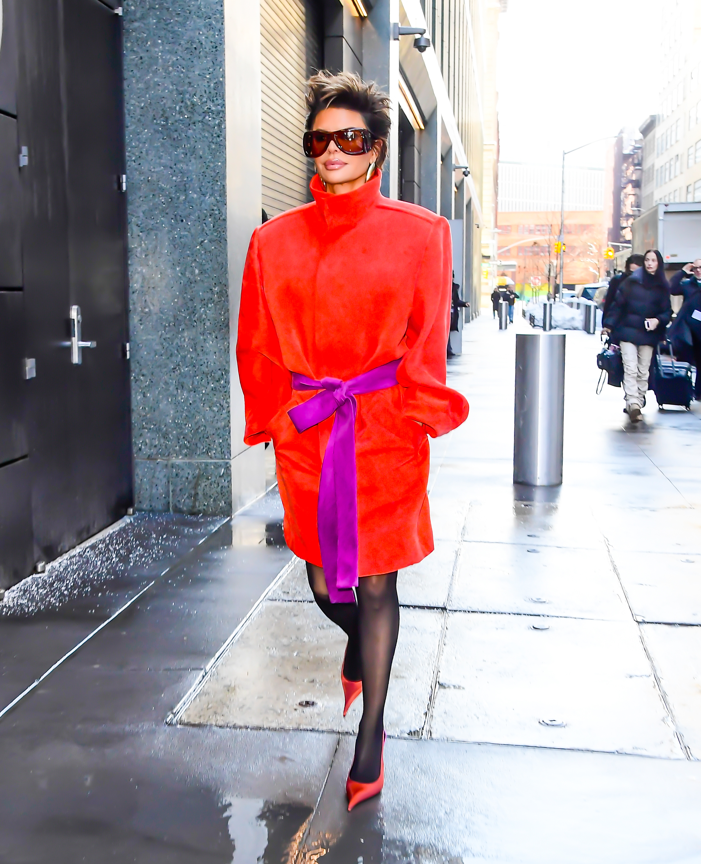 Even on an ordinary city sidewalk in 2026, Lisa Rinna carried herself like she was stepping onto a runway. Her bold styling and relaxed confidence turned a brief walk between appearances into another attention-grabbing fashion moment for the cameras. | Source: Getty Images