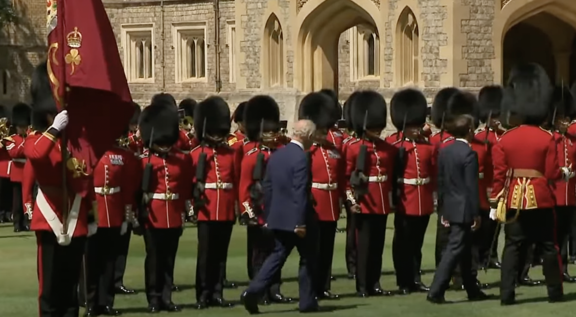 King Charles III and President Emmanuel Macron during a ceremonial inspection at Windsor Castle from a post dated July 8, 2025. | Source: YouTube/Sky News