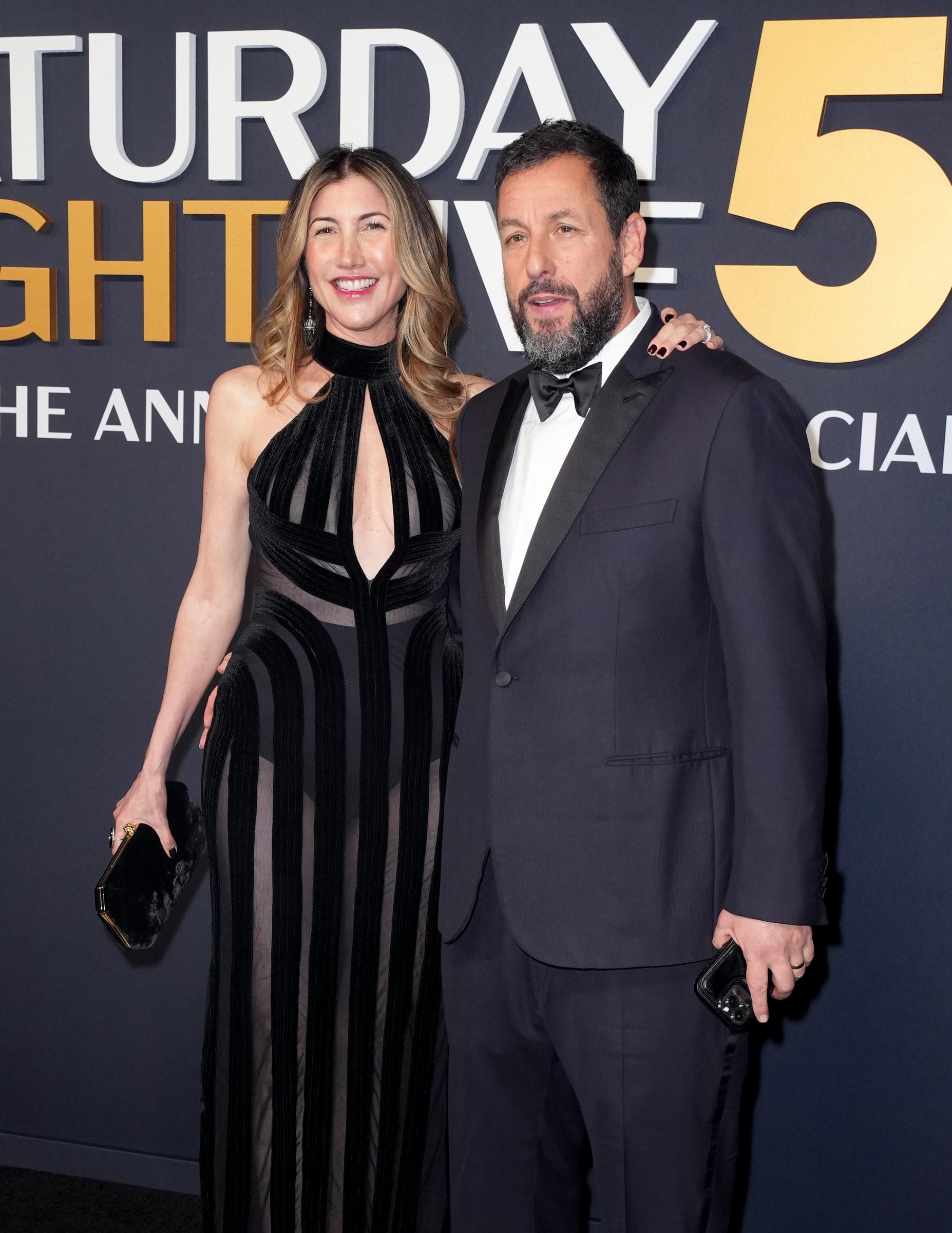 Jackie Sandler and Adam Sandler are seen at "SNL50: The Anniversary Special" at 30 Rockefeller Plaza on February 16, 2025, in New York | Source: Getty Images