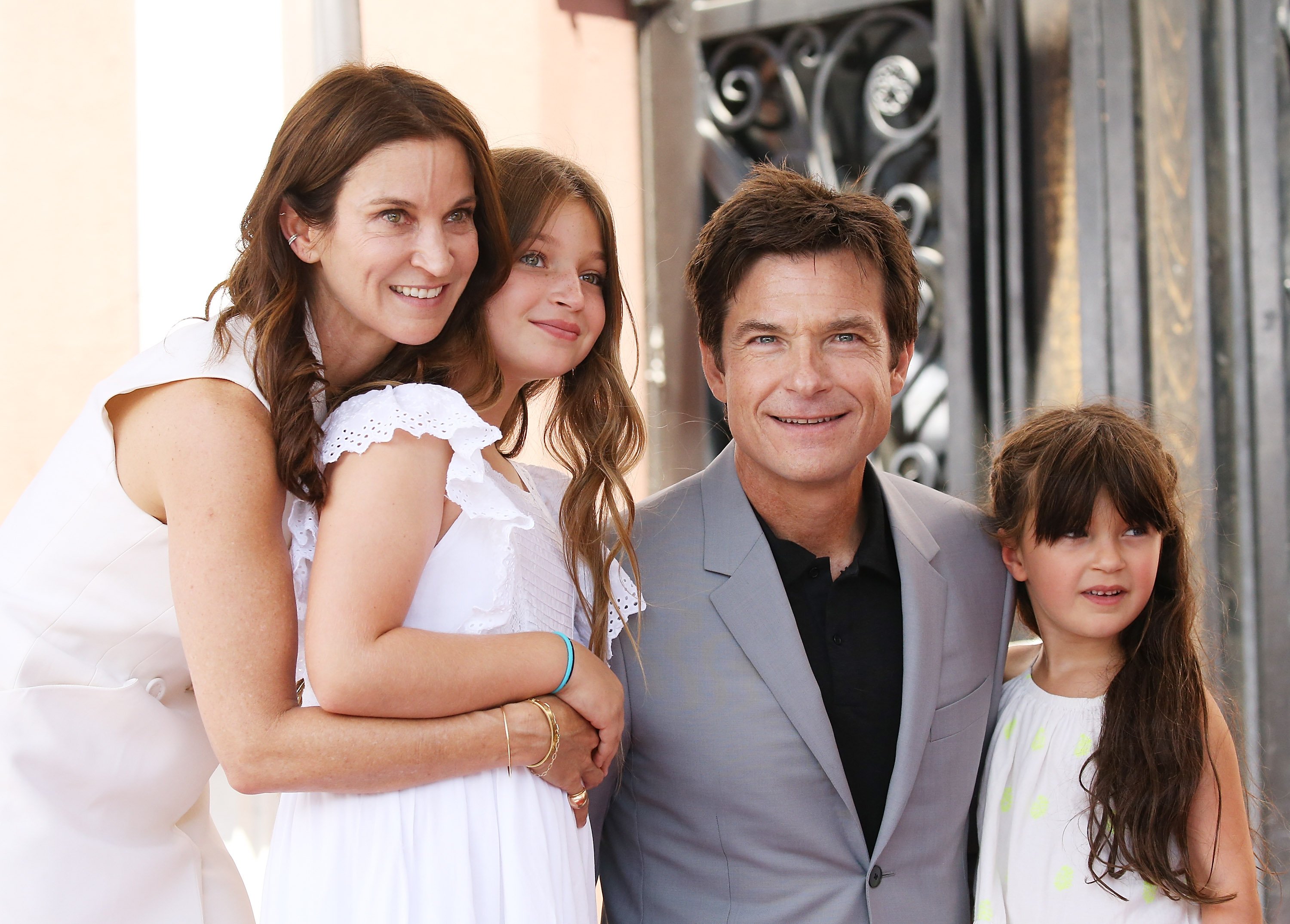 Amanda Anka with Jason Bateman and their daughters attend the Jason Bateman's Hollywood Walk of Fame honor on July 26, 2017. | Photo: Getty Images