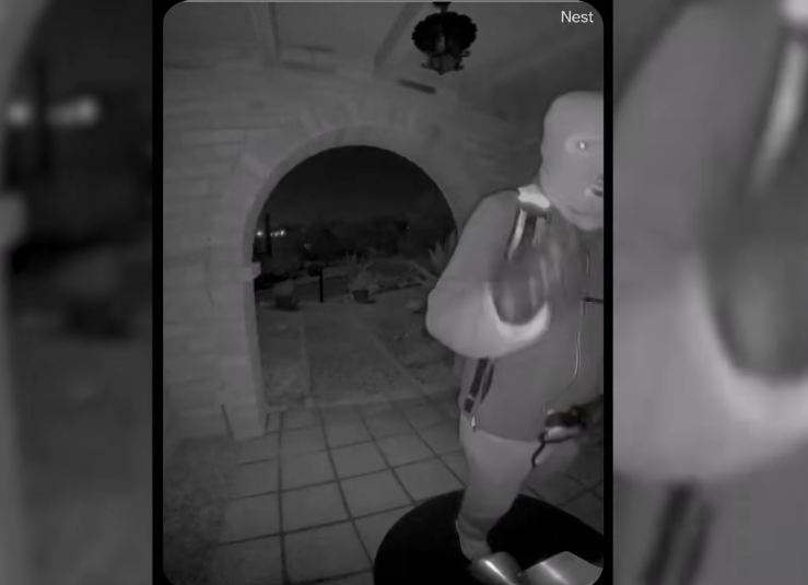 A masked individual on Nancy Guthrie's front porch, from a video dated February 10, 2026 | Source: YouTube/USA Today