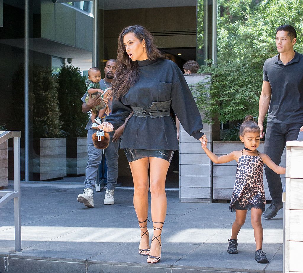 Kim Kardashian and Kanye West with children are seen leaving their hotel on August 29, 2016. | Photo: Getty Images