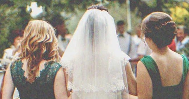 A bride with her bridesmaids | Source: Shutterstock