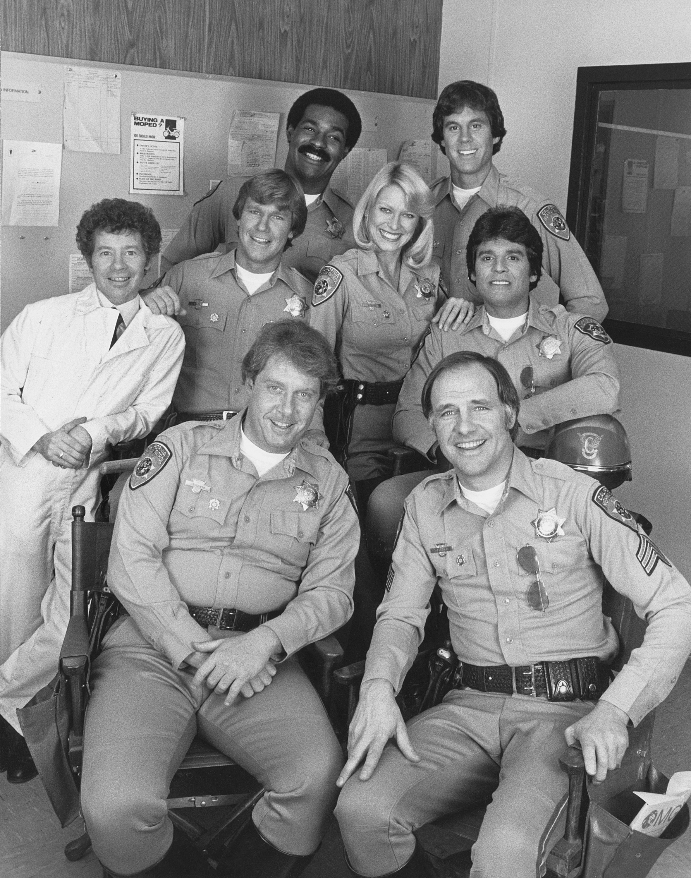 "CHiPs" cast l-r, rear) Michael Dorn, Brodie Greer, (l-r, center) Lou Wagner, Larry Wilcox, Randi Oakes, Erik Estrada, (l-r, front) Paul Linke, Robert Pine | Source: Getty Images