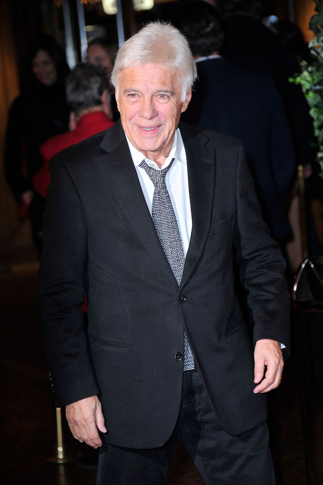 Guy Bedos assiste à la première parisienne de "La Famille Belier" au Grand Rex le 9 décembre 2014 à Paris, France. | Photo : Getty Images