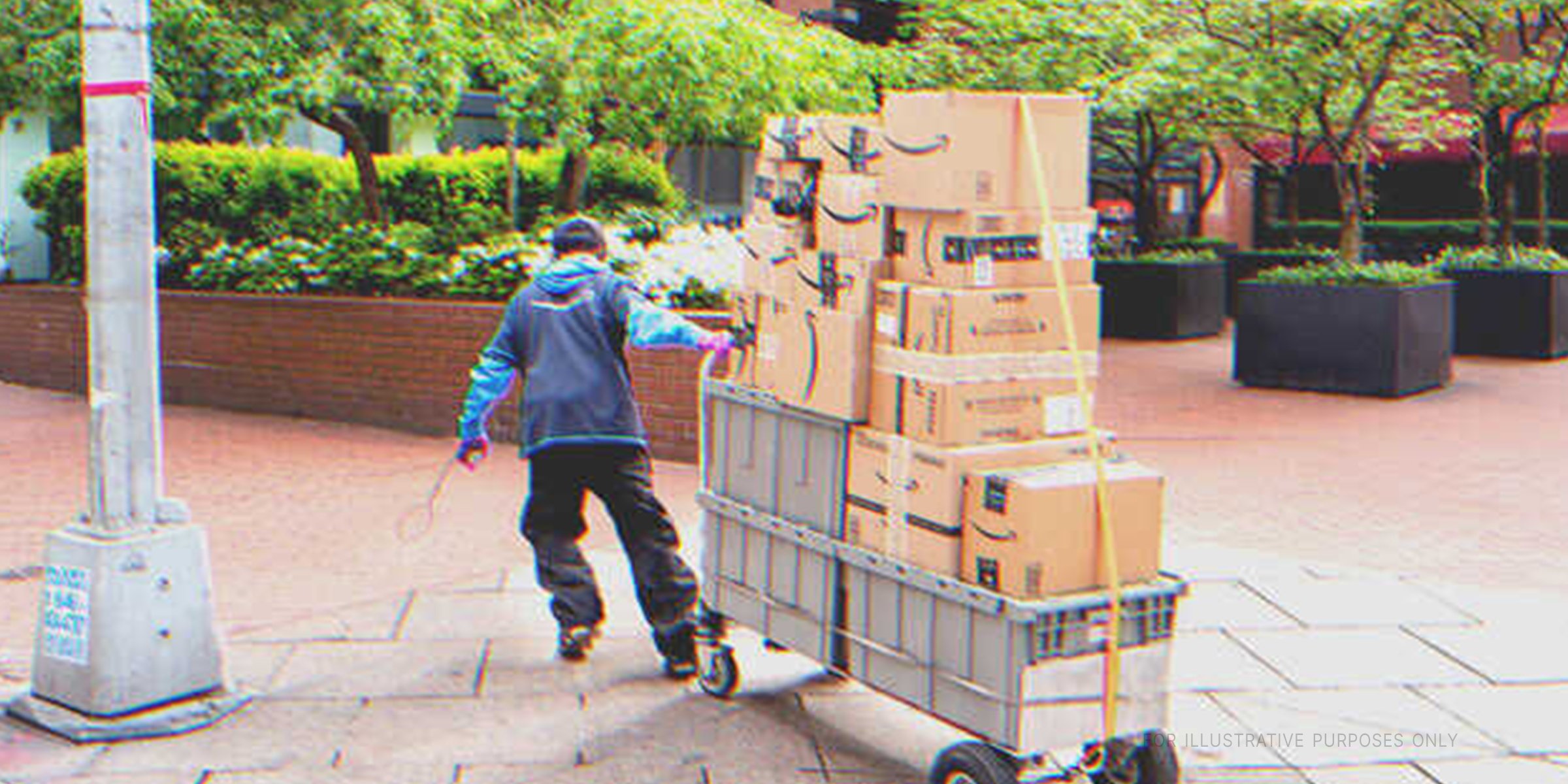 Man transporting boxes. | Shutterstock