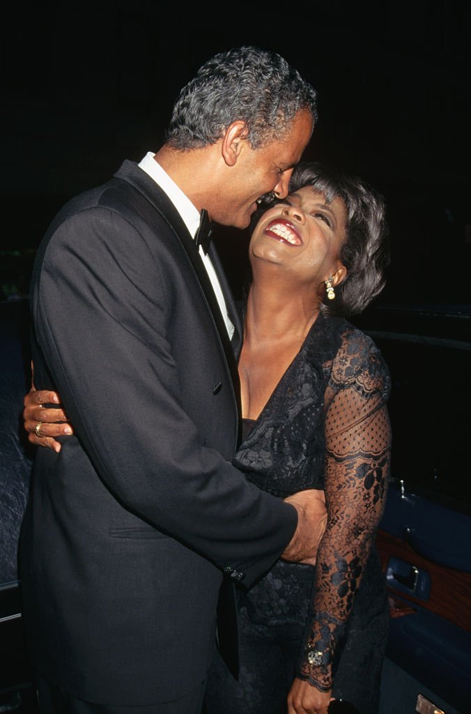 Author, businessman, and ex-athlete Stedman Graham hugs his girlfriend, talk show host Oprah Winfrey at Radio City Music Hall | Source: Getty Images