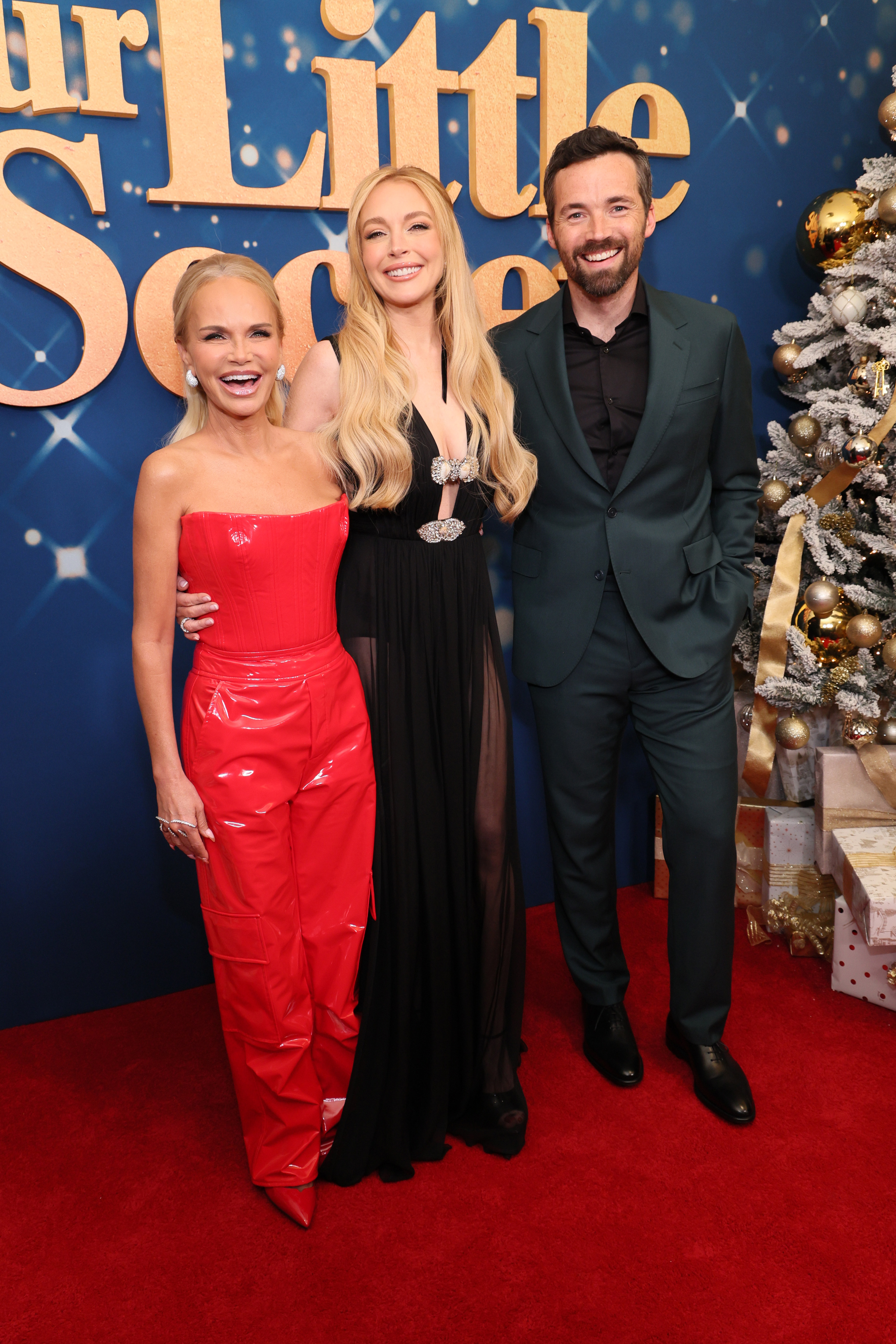 Kristin Chenoweth, Lindsay Lohan, and Ian Harding attend the screening of Netflix's "Our Little Secret" on November 18, 2024 | Source: Getty Images