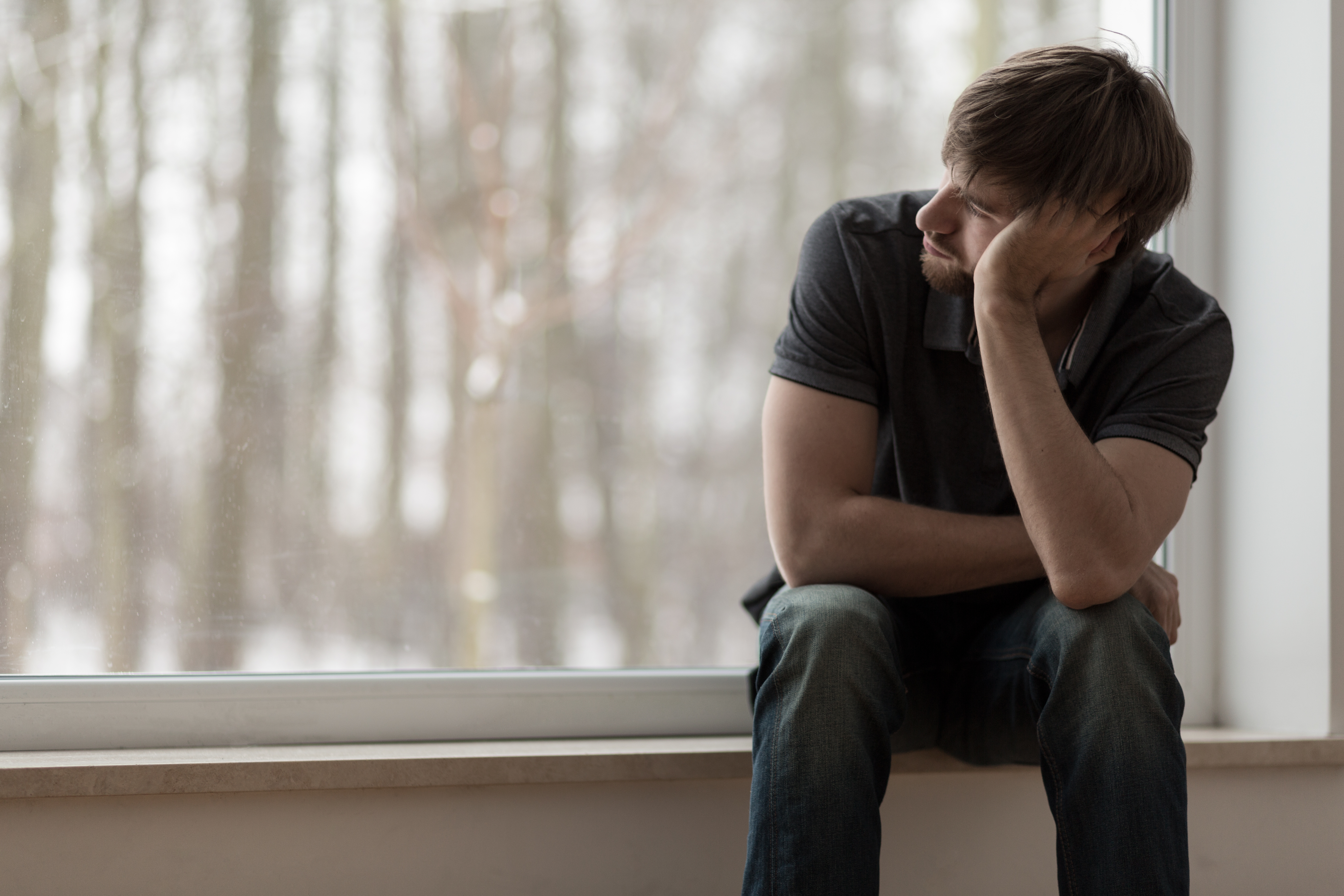 Young miserable depressed man | Source: Shutterstock