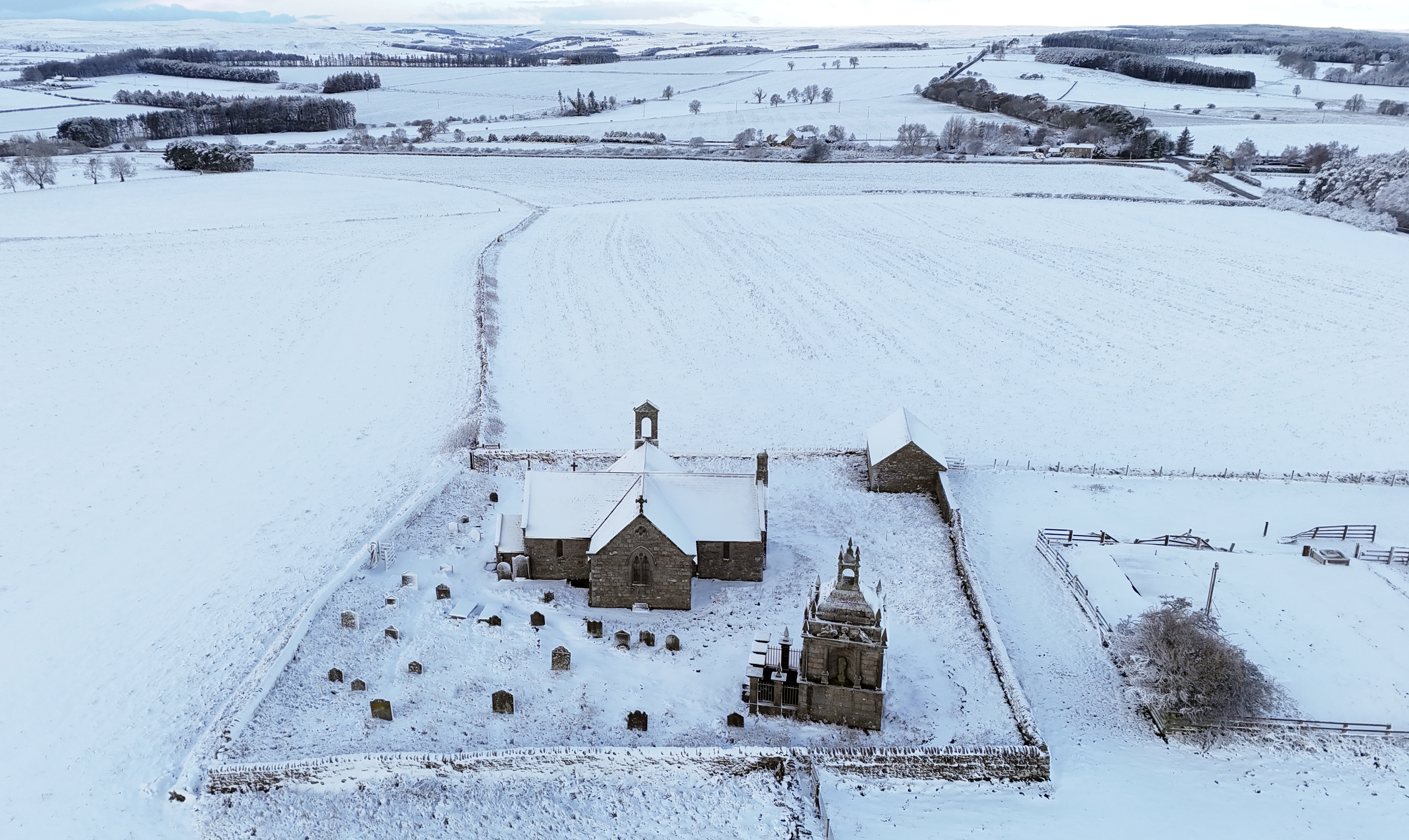 Overnight snow covering St. Andrew's Church on Kiln Pit Hill in Northumberland, England, on November 19, 2025. | Source: Getty Images