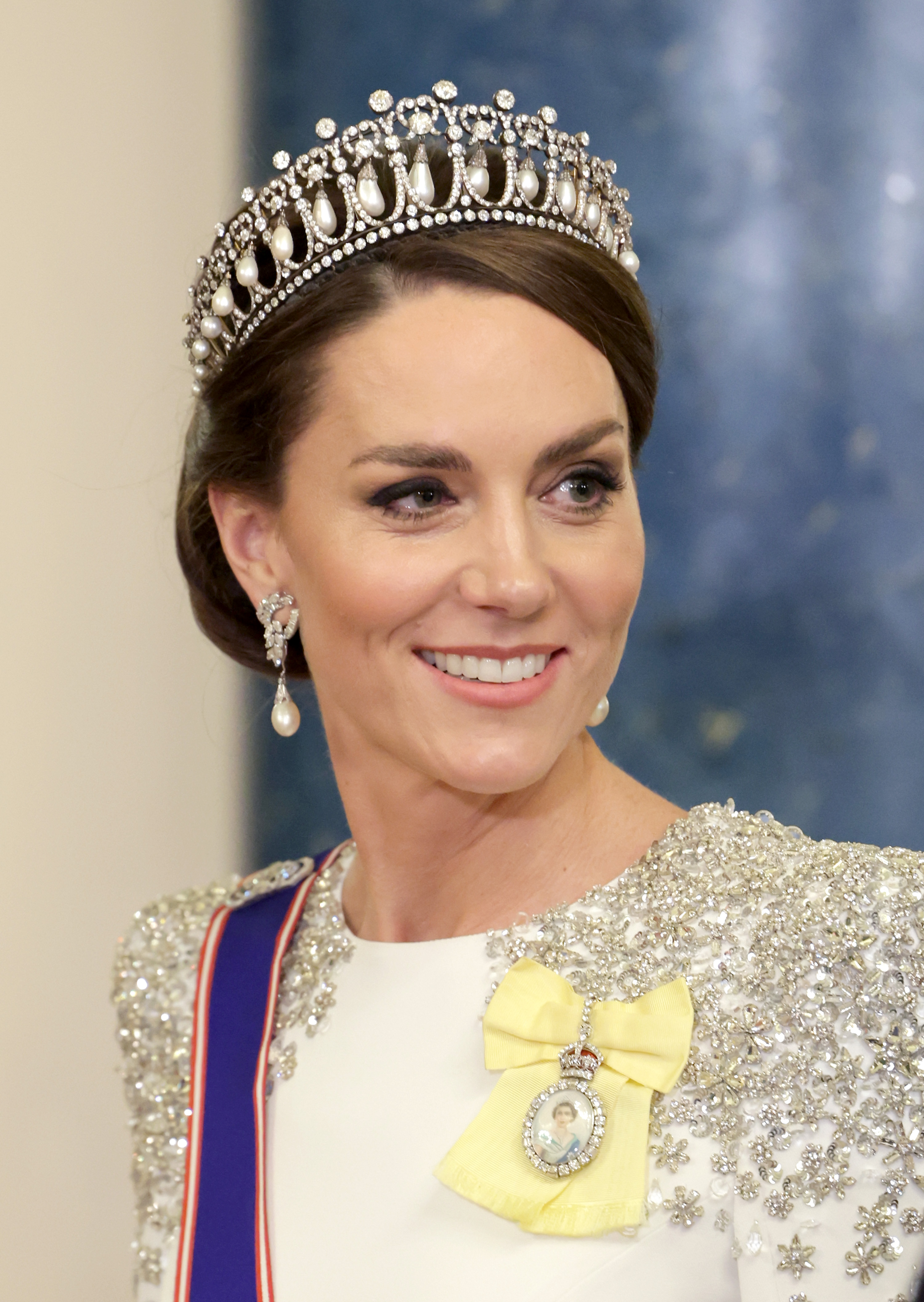 Kate Middleton dazzles in a sparkling gown and tiara at a grand State Banquet, embodying modern royal glamour during a landmark occasion in the reign of King Charles III.