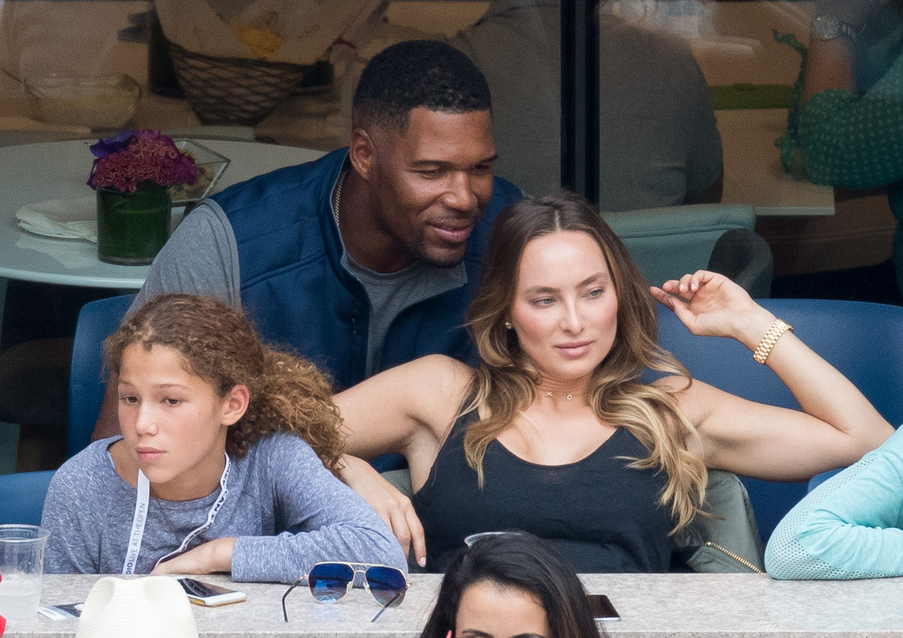 Michael Strahan with his daughter, and Kayla Quick attend the 2016 US Open in New York City on September 5, 2016 | Source: Getty Images