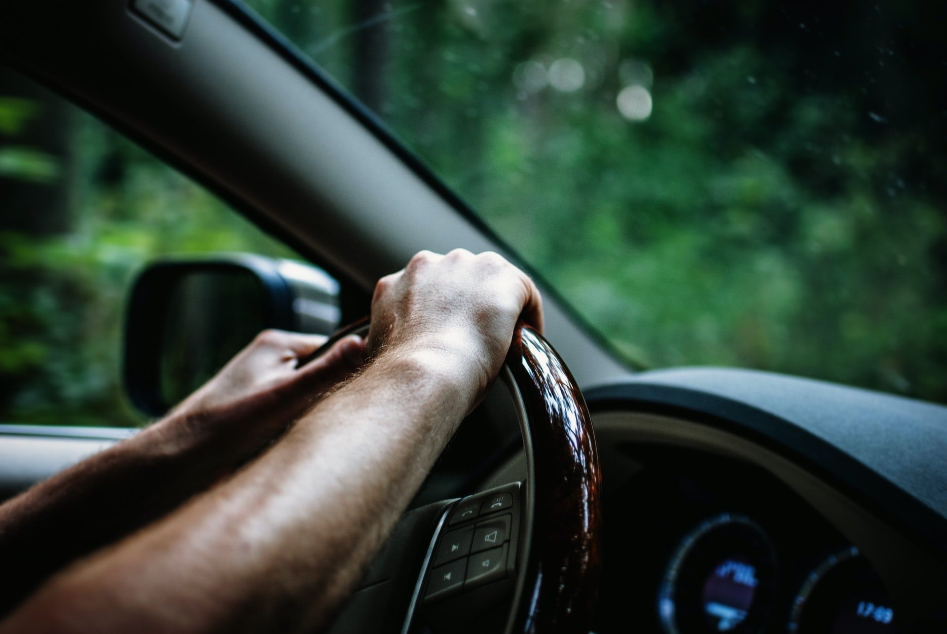 A person driving a car | Source: Unsplash