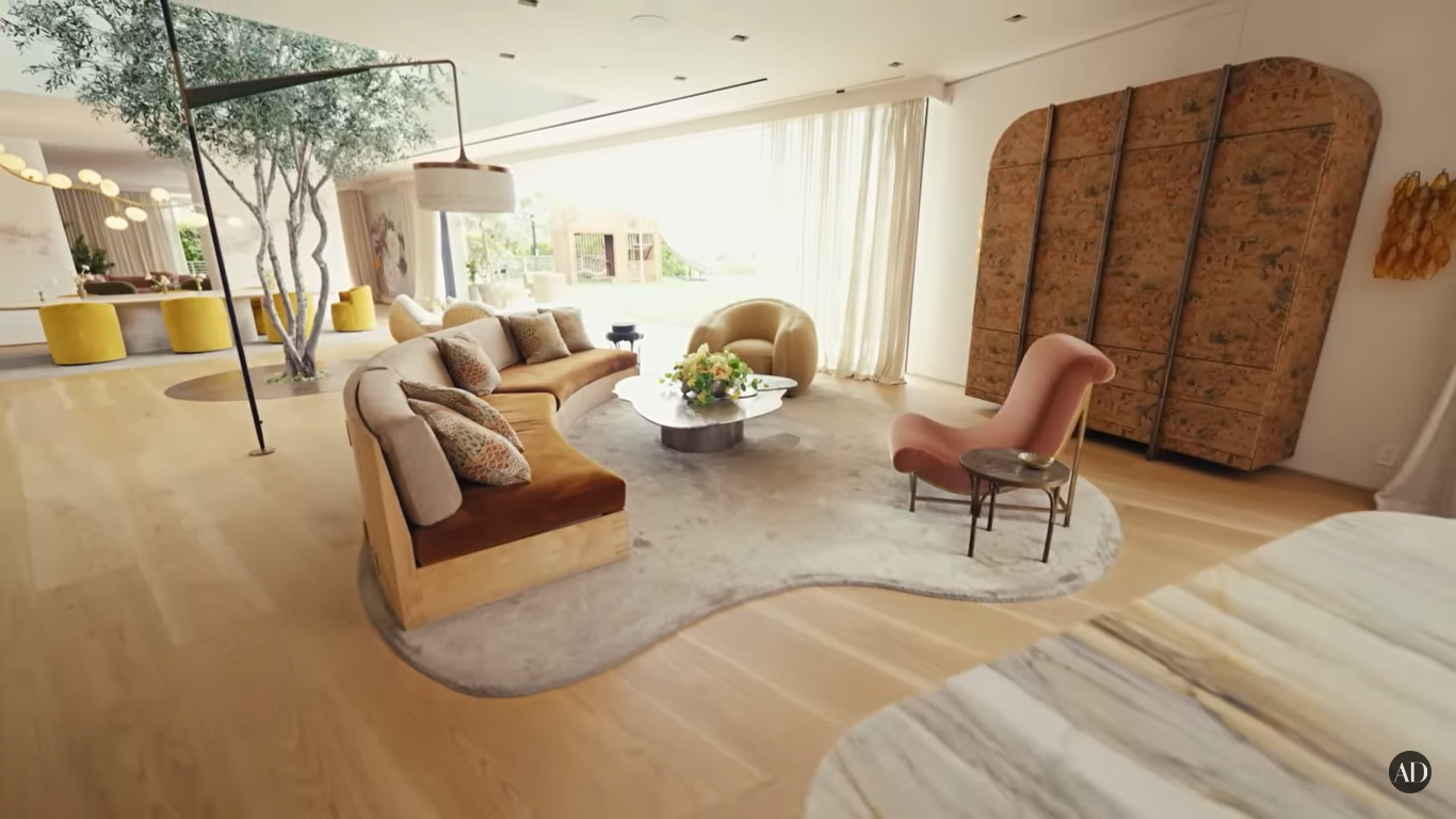 Chrissy Teigen and John Legend's living room at their Beverly Hills home | Source: YouTube/ArchitecturalDigest