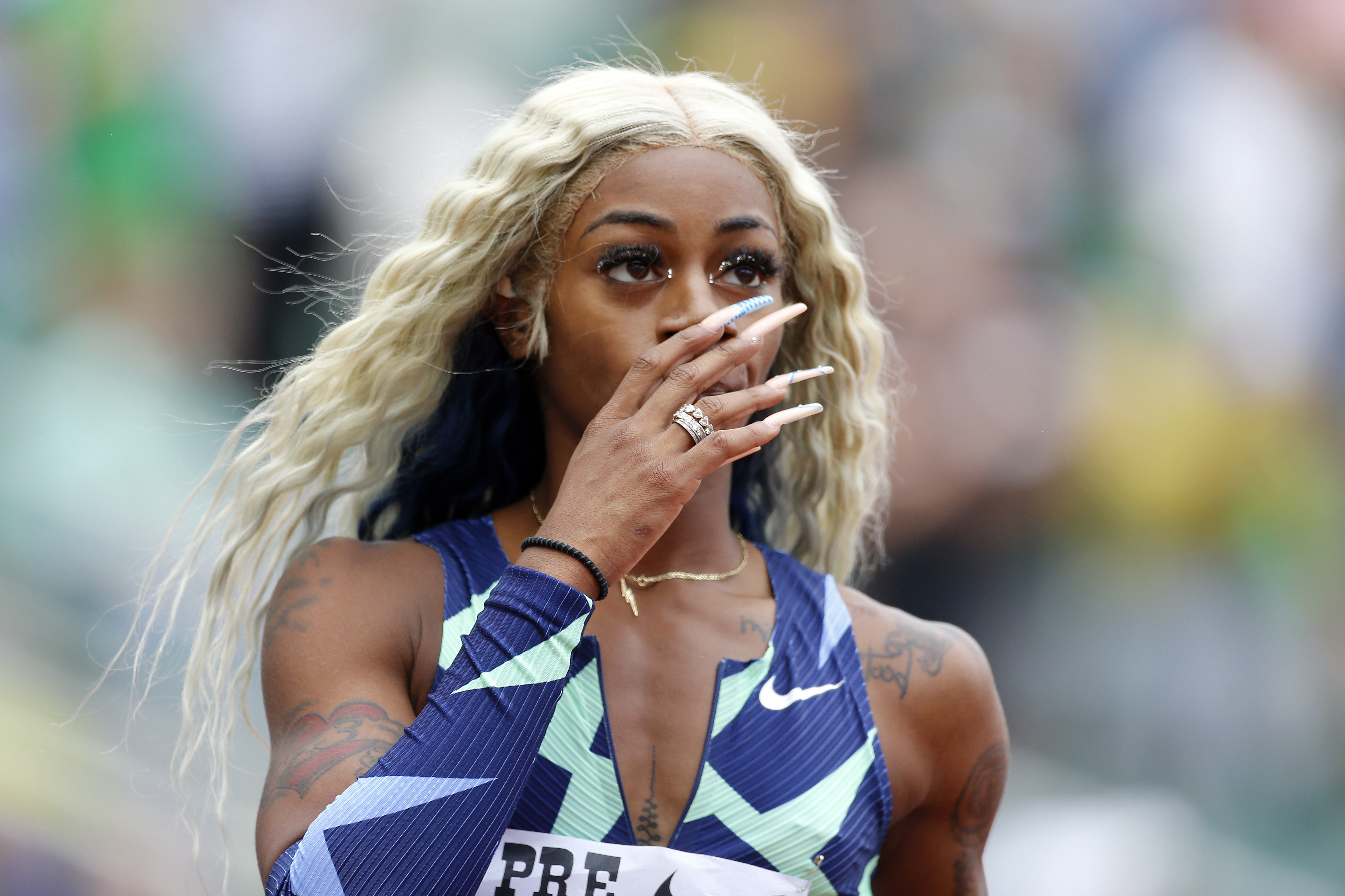 Sha'Carri Richardson reacts after finishing last in the 100m race during the Wanda Diamond League Prefontaine Classic on August 21, 2021, in Eugene, Oregon. | Source: Getty Images