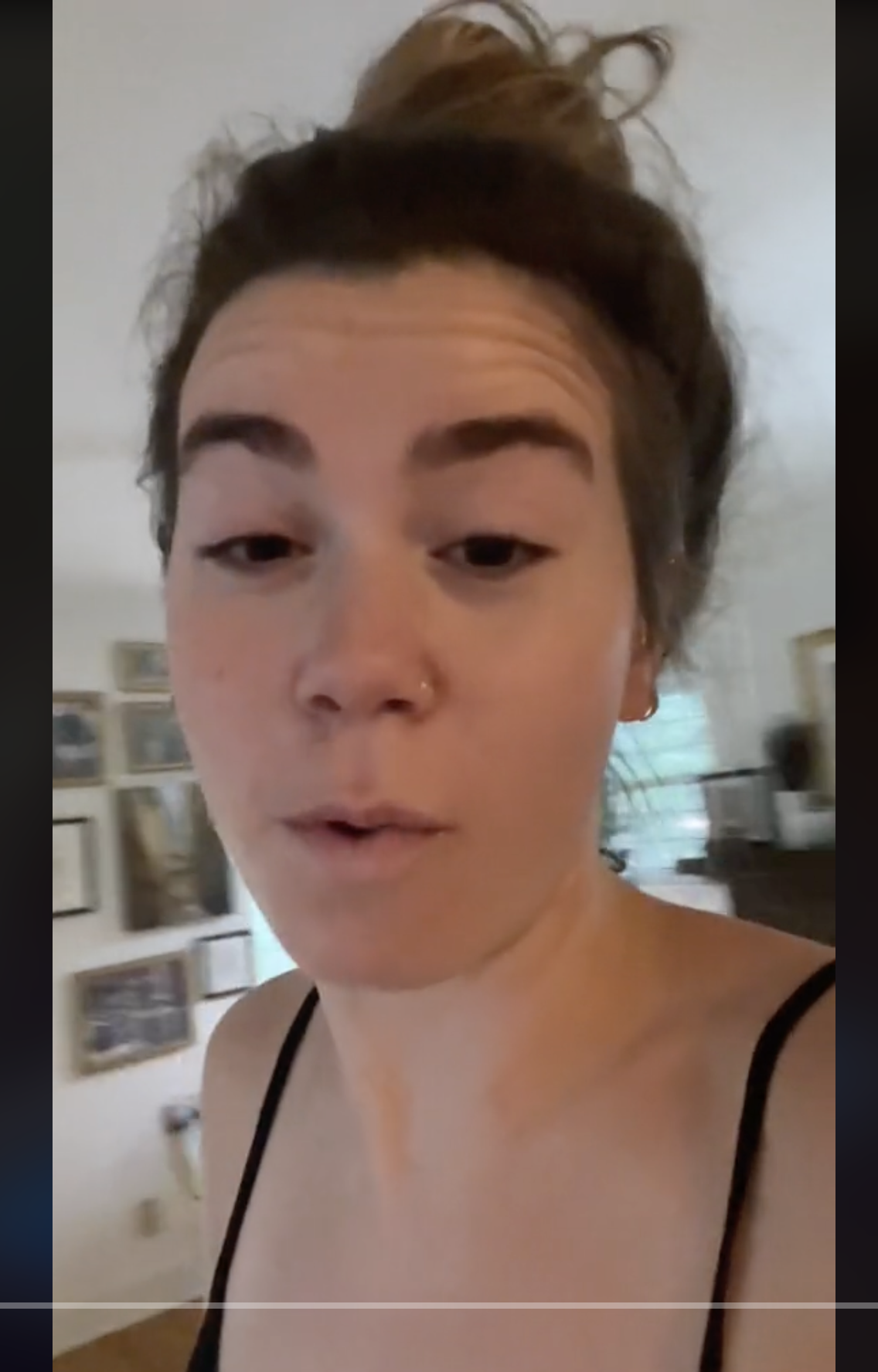 Julia Henning shares her thoughts on discovering a secret trapdoor inside her house in a video dated June 20, 2023 | Source: tiktok.com/@iamjuliahenning