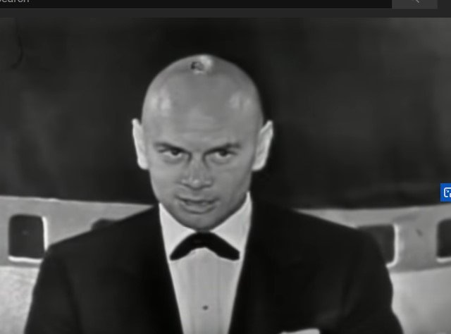Yul Brynner wins the Oscar for Best Actor for "The King and I" at the 29th Academy Awards at the 1957 Oscars | Photo: Youtube / Oscars