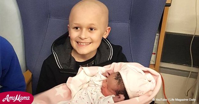 Tearful moment terminally ill boy holds newborn baby sister before dying of cancer