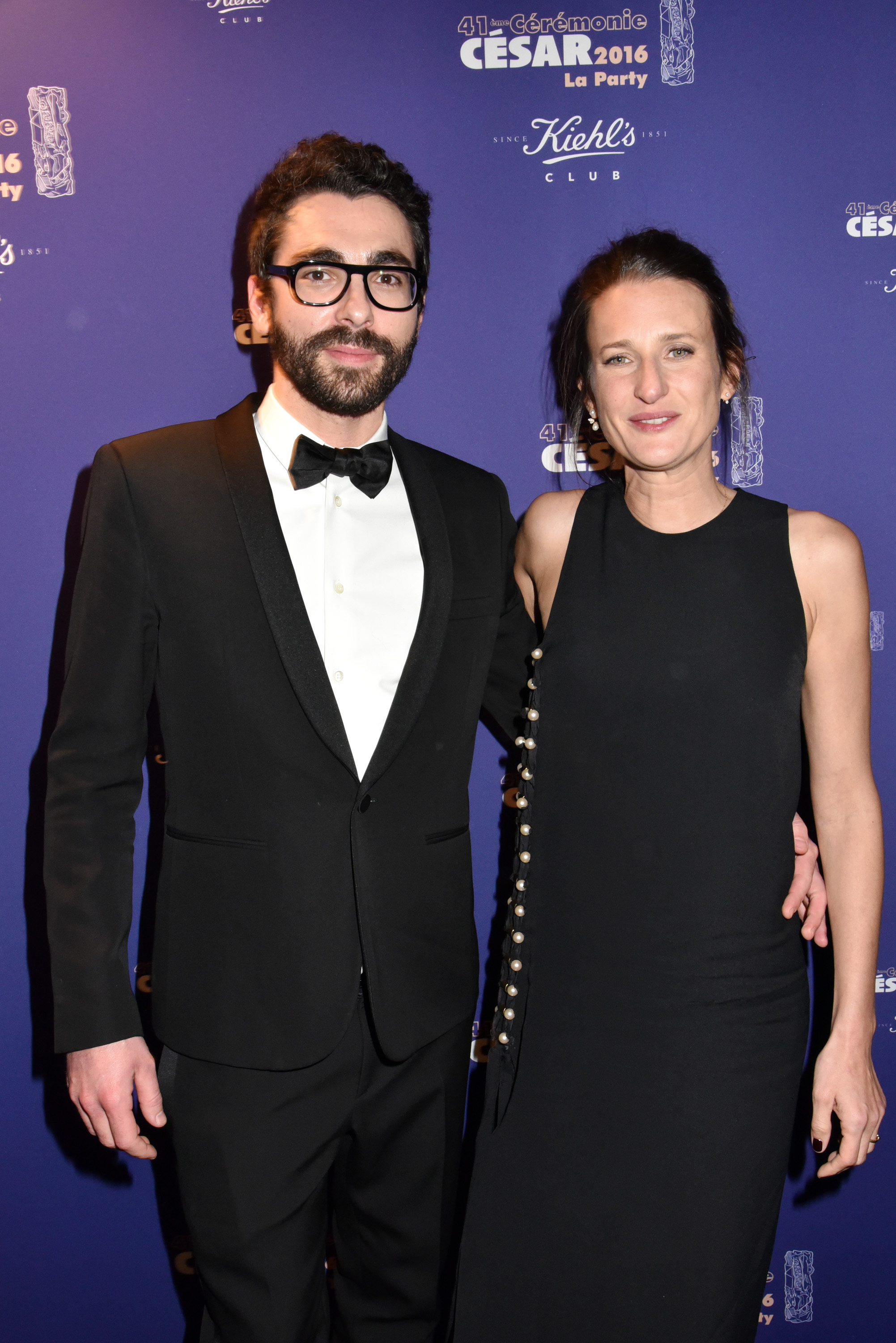 Benjamin Mahon and Camille Cottin attend the photocall at the Queen Club after The Cesar Film Awards 2016 on February 26, 2016, in Paris, France. | Source: Getty Images