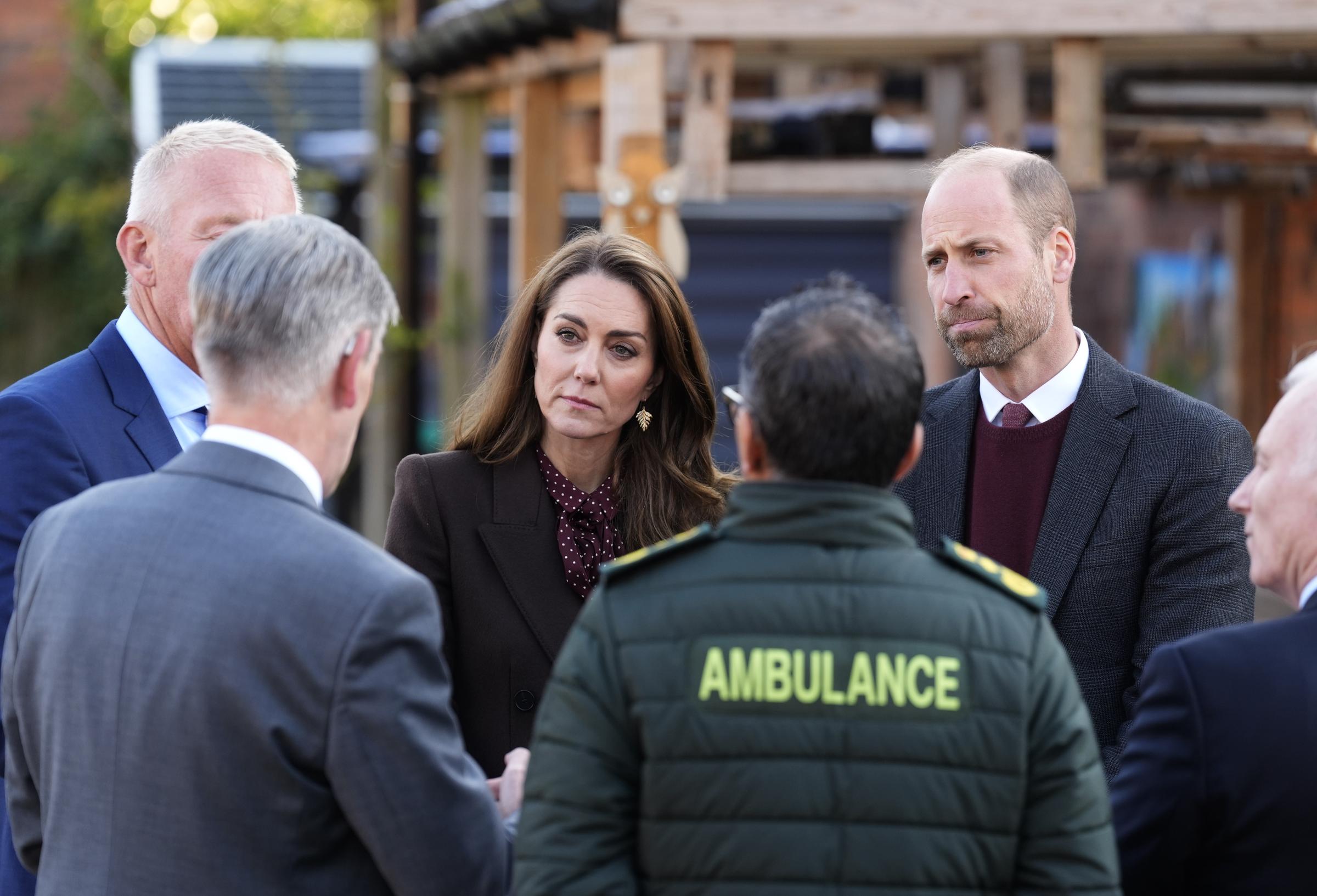 Princess Catherine and Prince William speaking with members of the Emergency Services on October 10, 2024 | Source: Getty Images