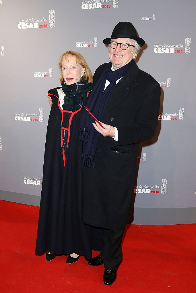 Claude Rich et son épouse arrivent aux César du cinéma 2013 au Théâtre du Chatelet, à Paris. | Photo : Getty Images
