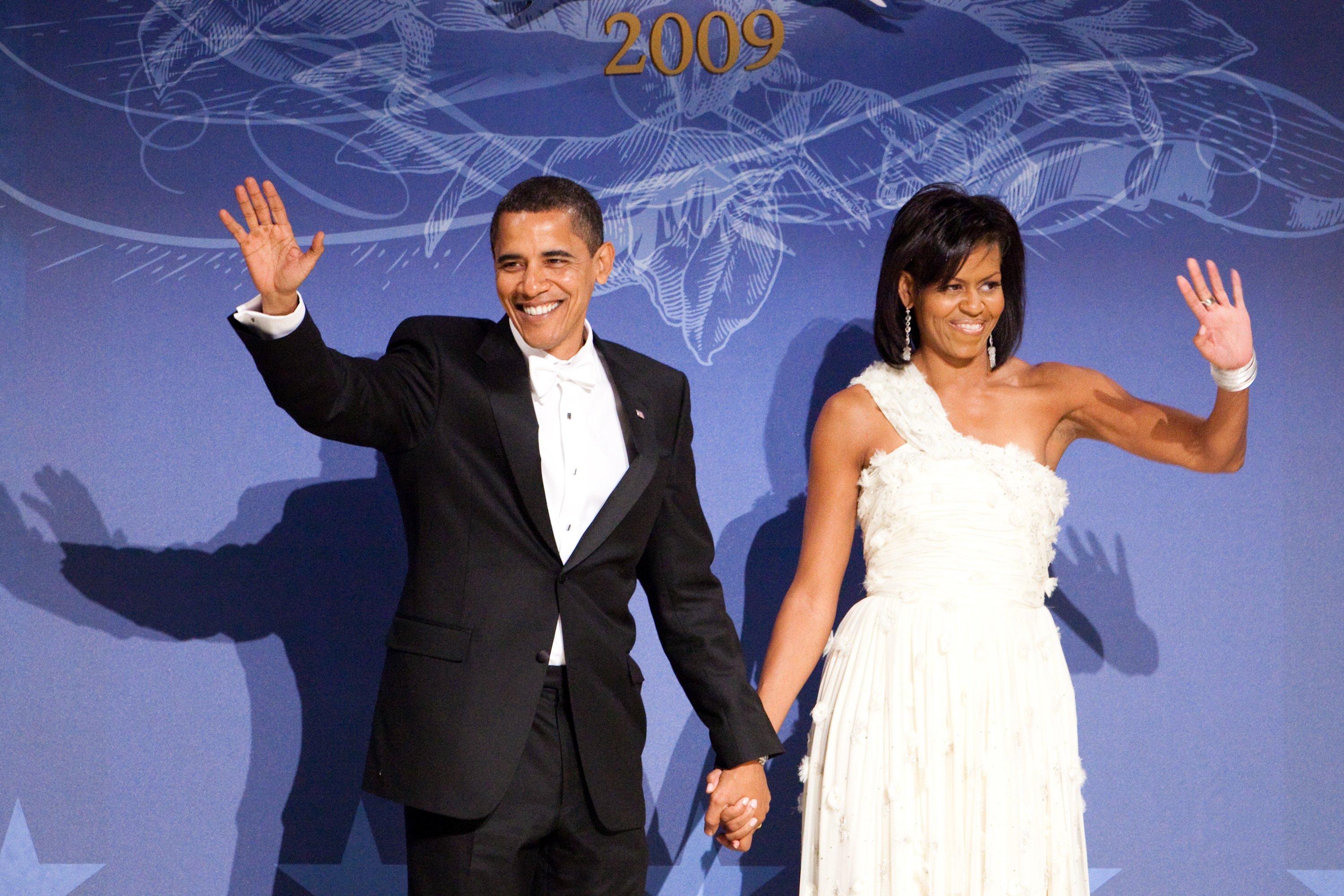 Barack Obama and Michelle Obama arrive hand in hand at the Southern Inaugural Ball on January 21, 2009, Washington, DC | Source: Brendan Hoffman/Getty Images