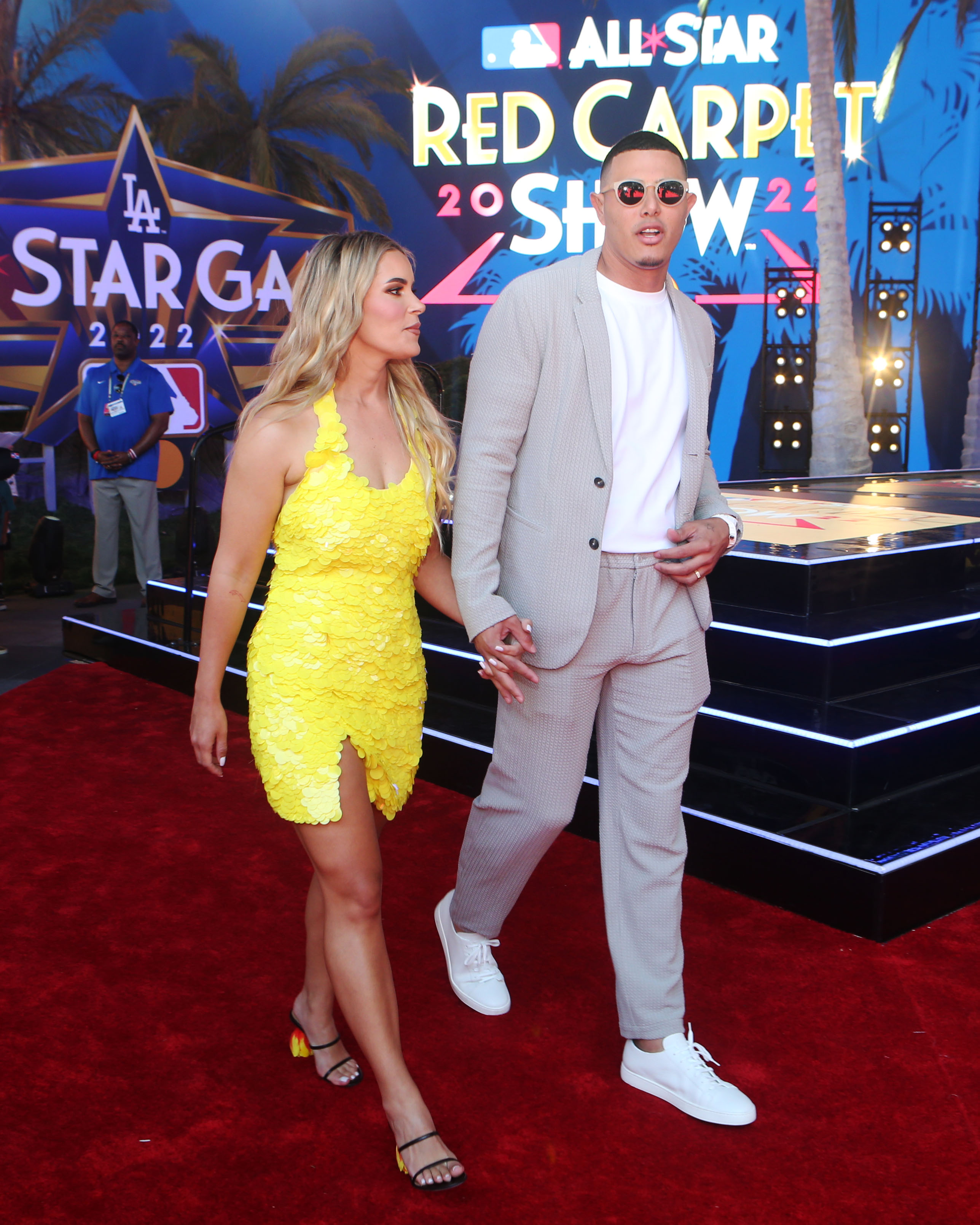 Manny Machado and Yainee Alonso during the All-Star Red Carpet Show at L.A. Live on Tuesday, July 19, 2022, in Los Angeles, California. | Source: Getty Images
