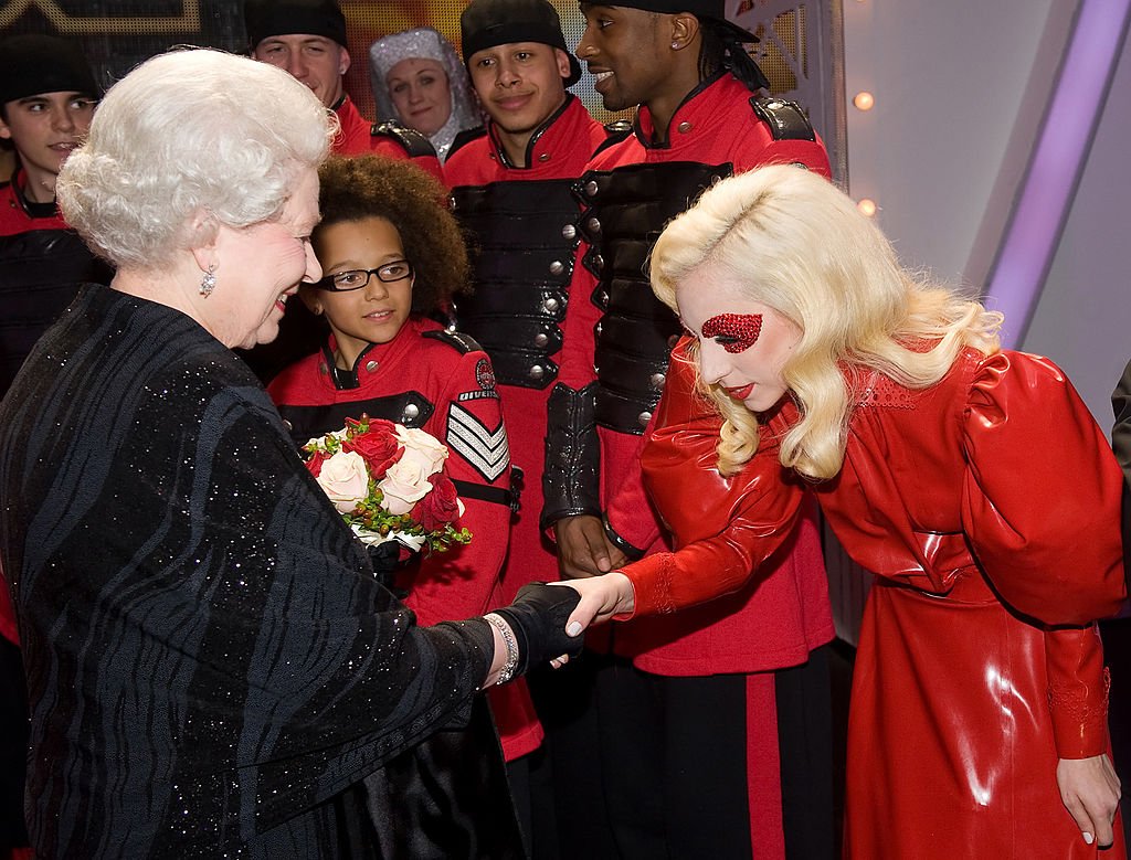Queen Elizabeth II met singer Lady Gaga following the Royal Variety Performance, in Blackpool, England, on December 7, 2009.. | Source: Getty Images
