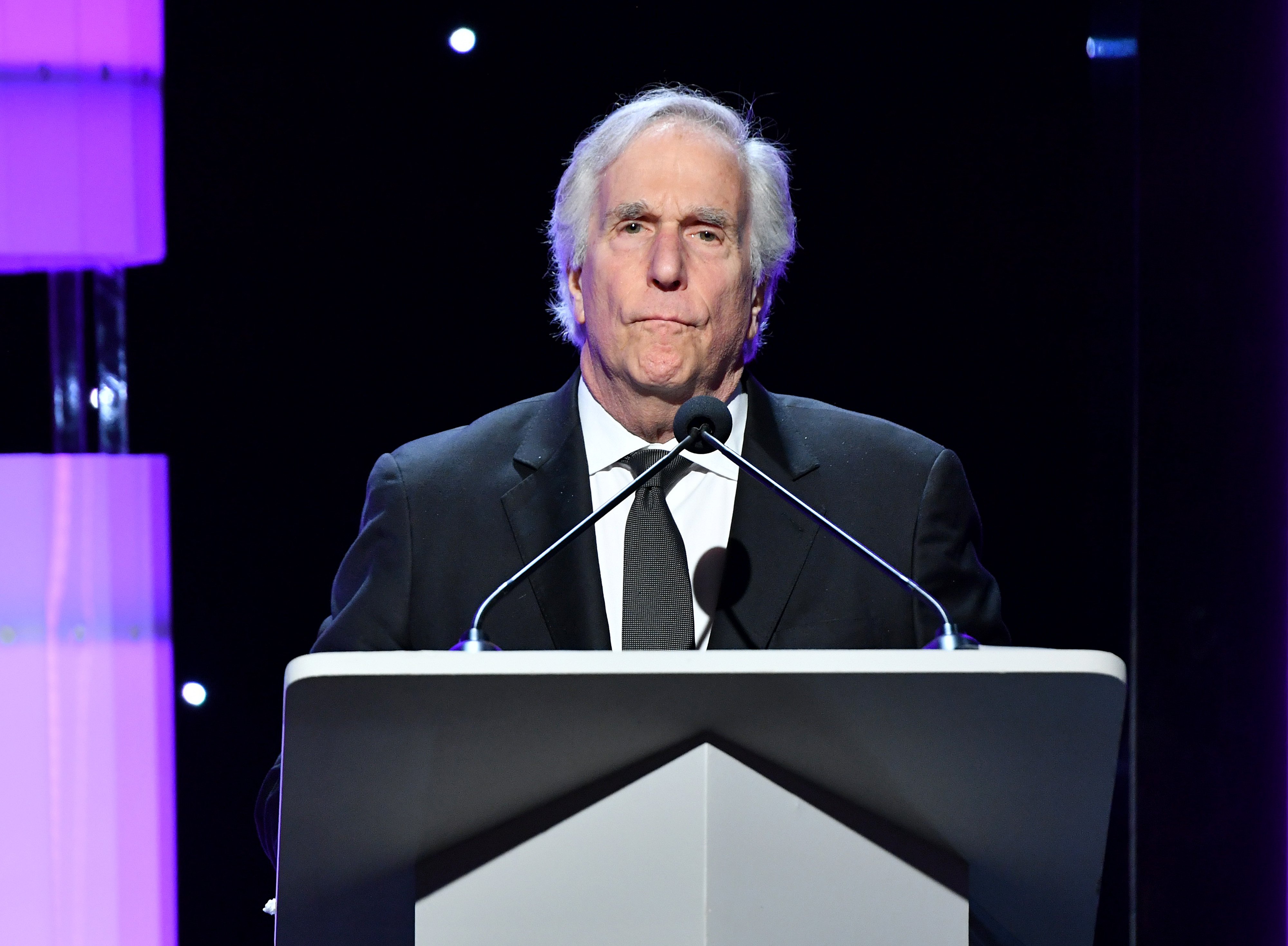 Author Henry Winkler speaking onstage during the 2020 Writers Guild Awards West Coast Ceremony at The Beverly Hilton Hotel on February 01, 2020 in Beverly Hills, California. | Source: Getty Images