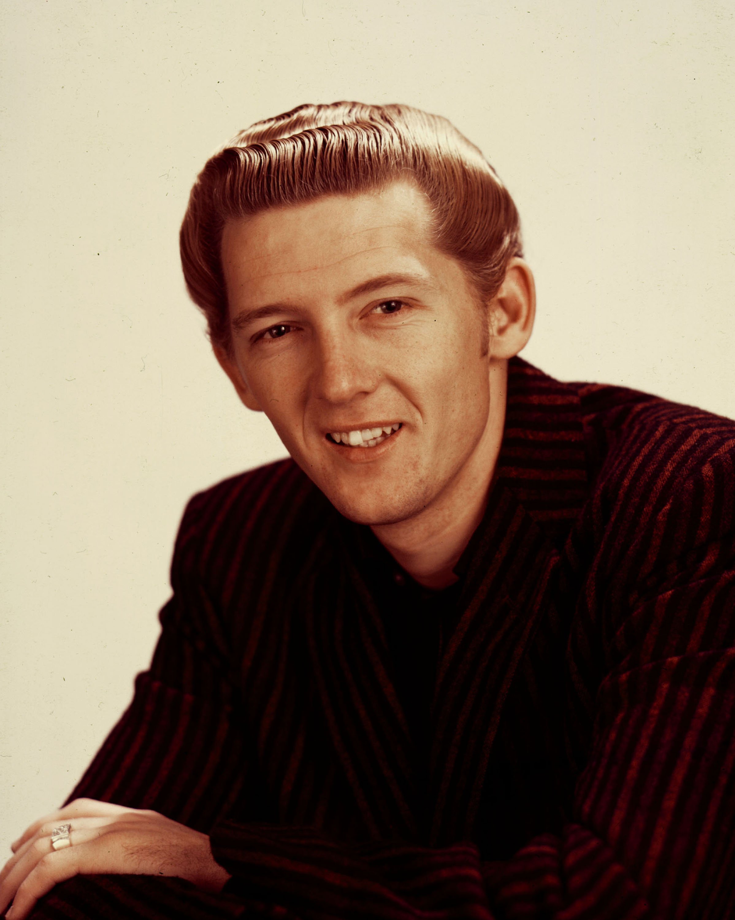 Rock 'n roll singer Jerry Lee Lewis poses for a portrait in the late 1950 | Photo: Getty Images